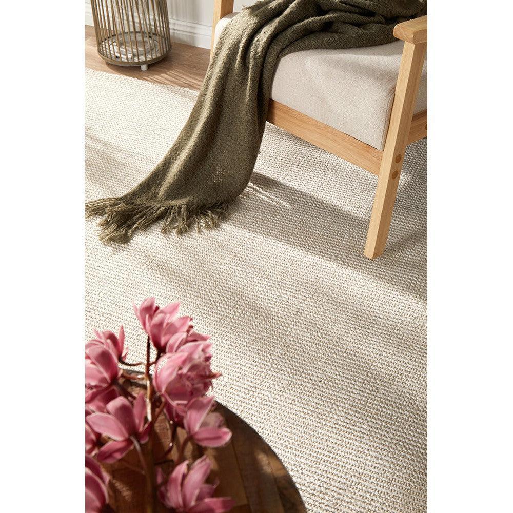Allie Ivory Cotton Rayon Rug featuring solid ivory textured weave on cream background, woven construction, cotton–rayon blend
