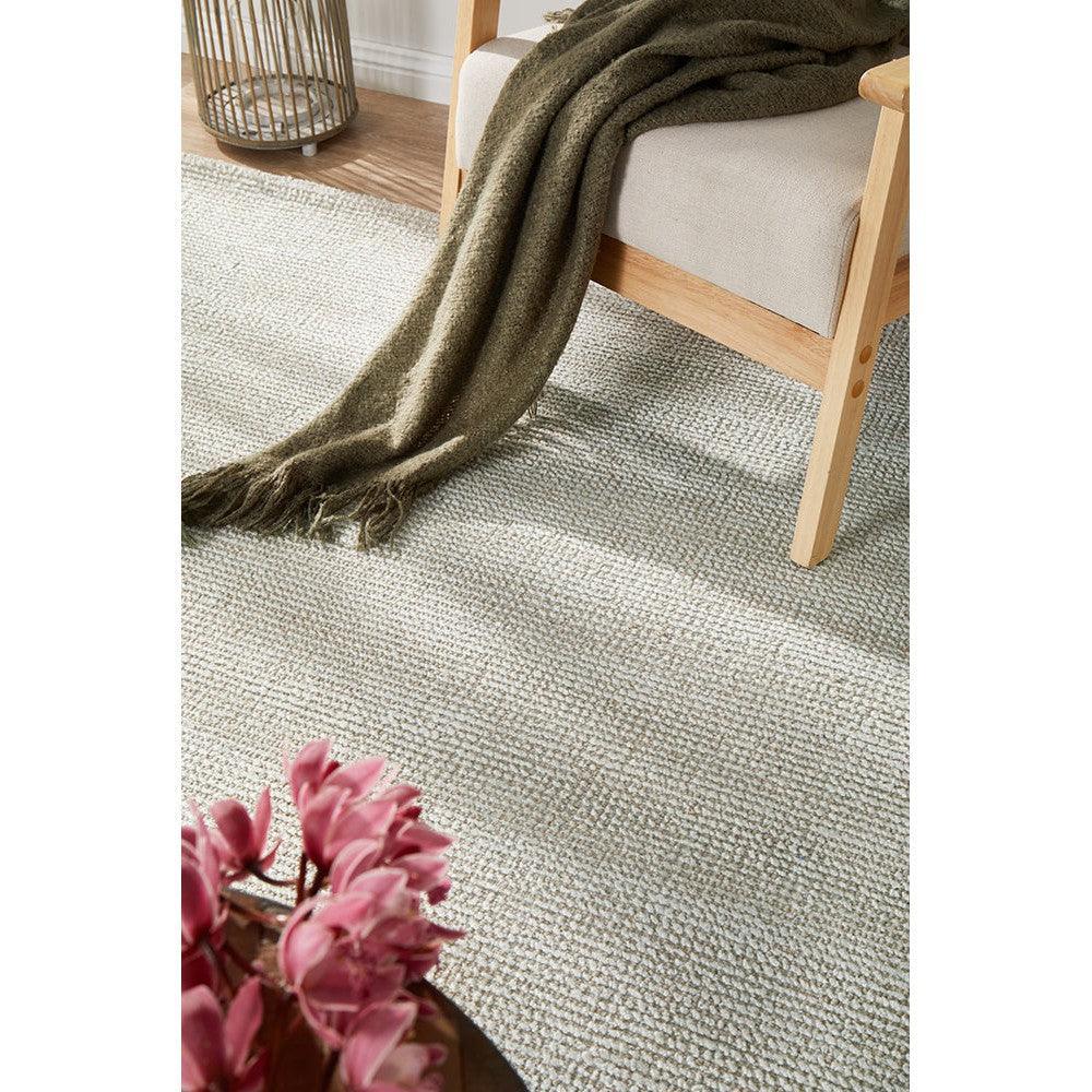 Allie Sky Cotton Rayon Rug featuring textured solid weave in light grey, ivory and taupe on cream background, machine-woven cotton-rayon