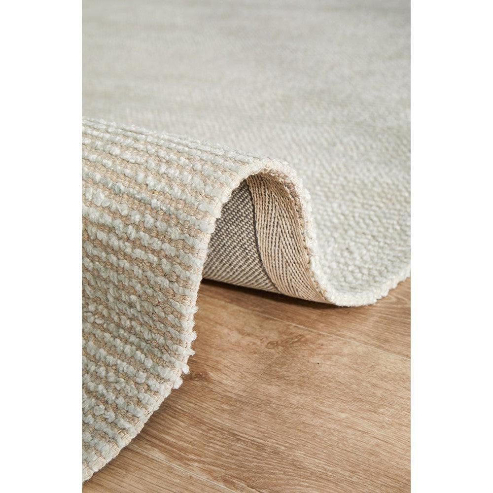 Allie Sky Cotton Rayon Rug featuring soft striped texture in ivory and cream on light beige background, machine-woven cotton-rayon