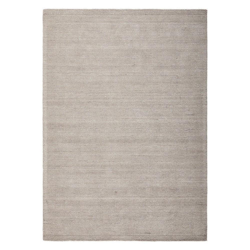 Allie Stone Cotton Rayon Rug featuring a subtle gradient solid pattern in beige and taupe on stone background, handcrafted rug