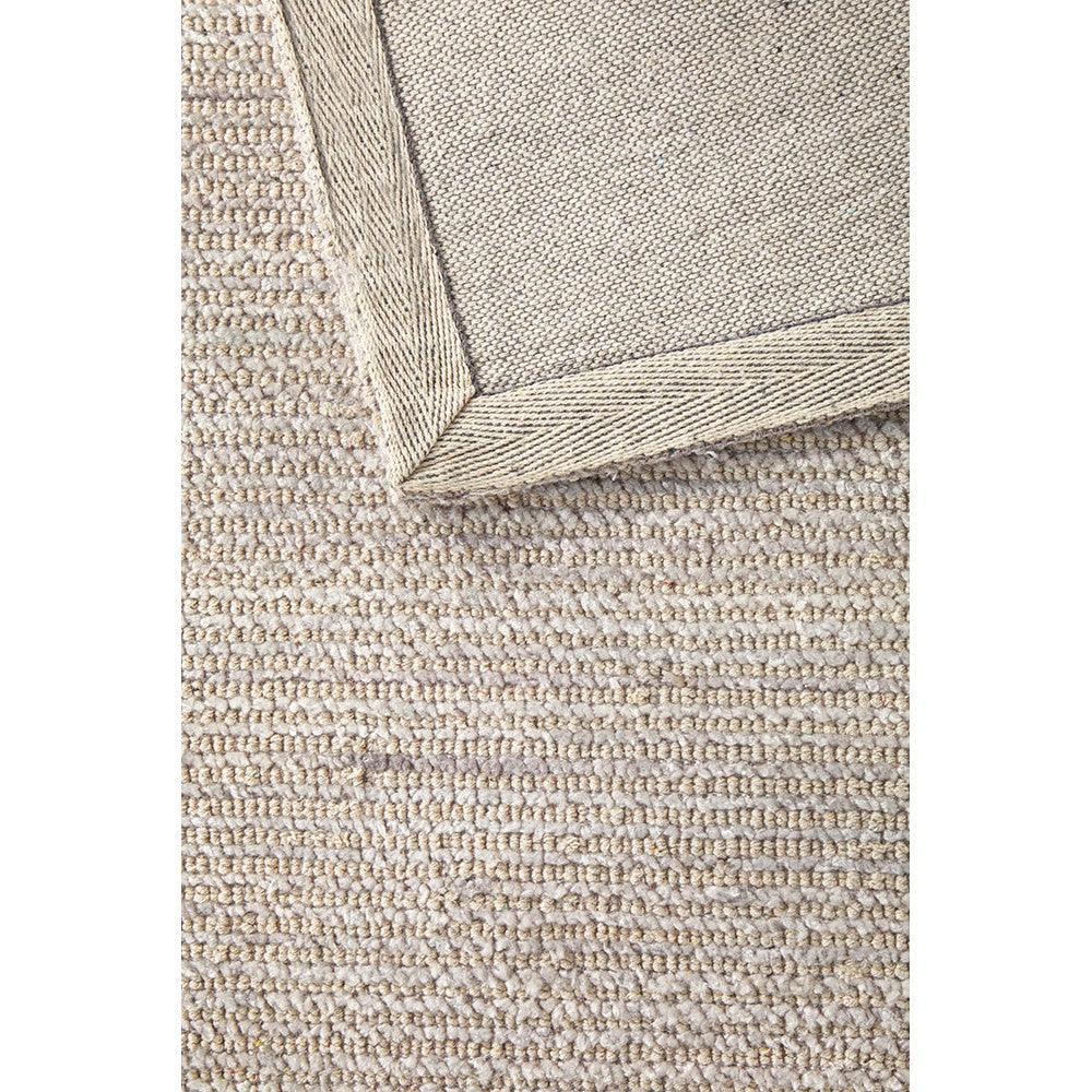 Allie Stone Cotton Rayon Rug featuring textured beige loop-pile with taupe border on cream background, handcrafted handwoven