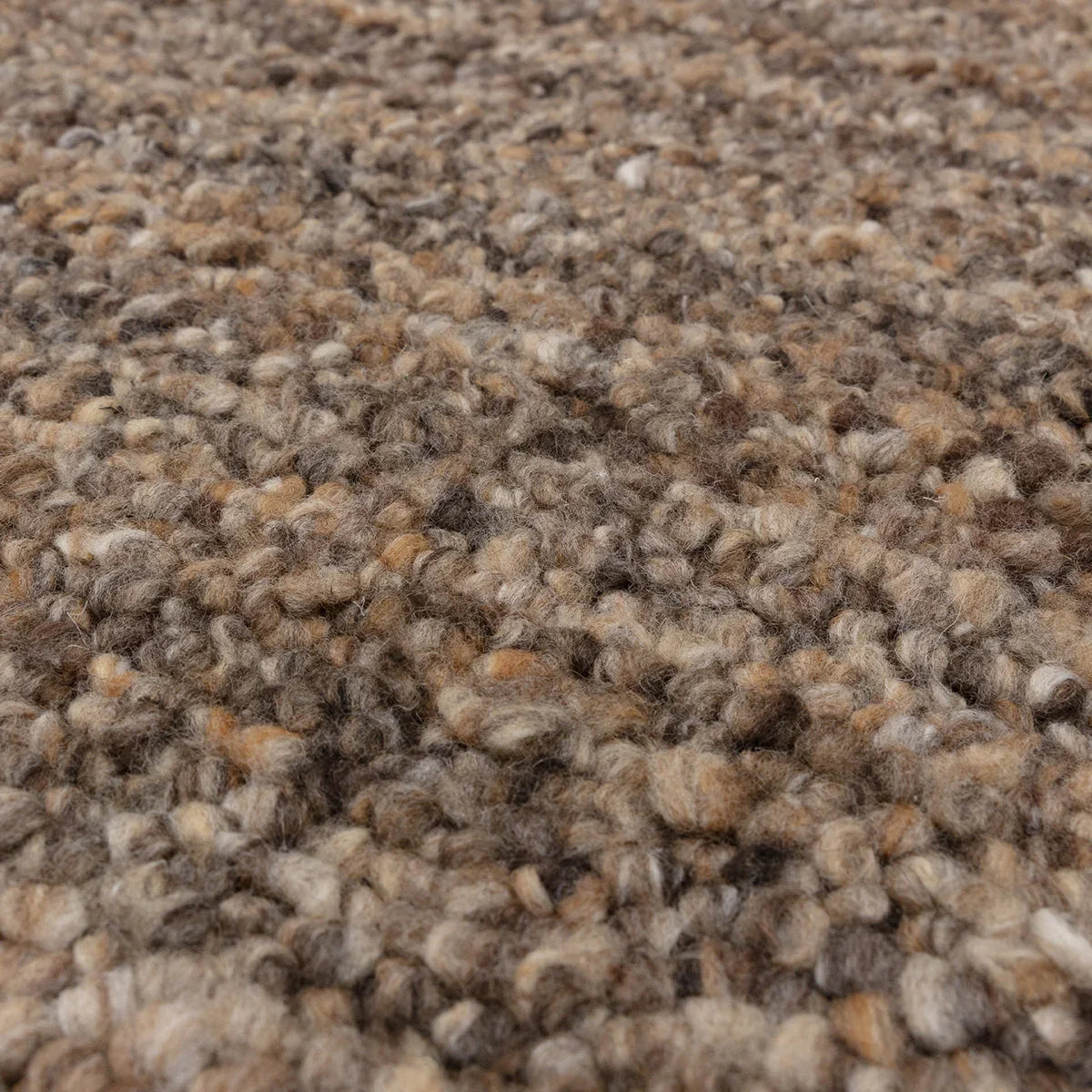 Asiatic Abbus Tawny Brown Designer Rug featuring textured shag in tawny, beige, taupe and ivory on beige background, tufted wool