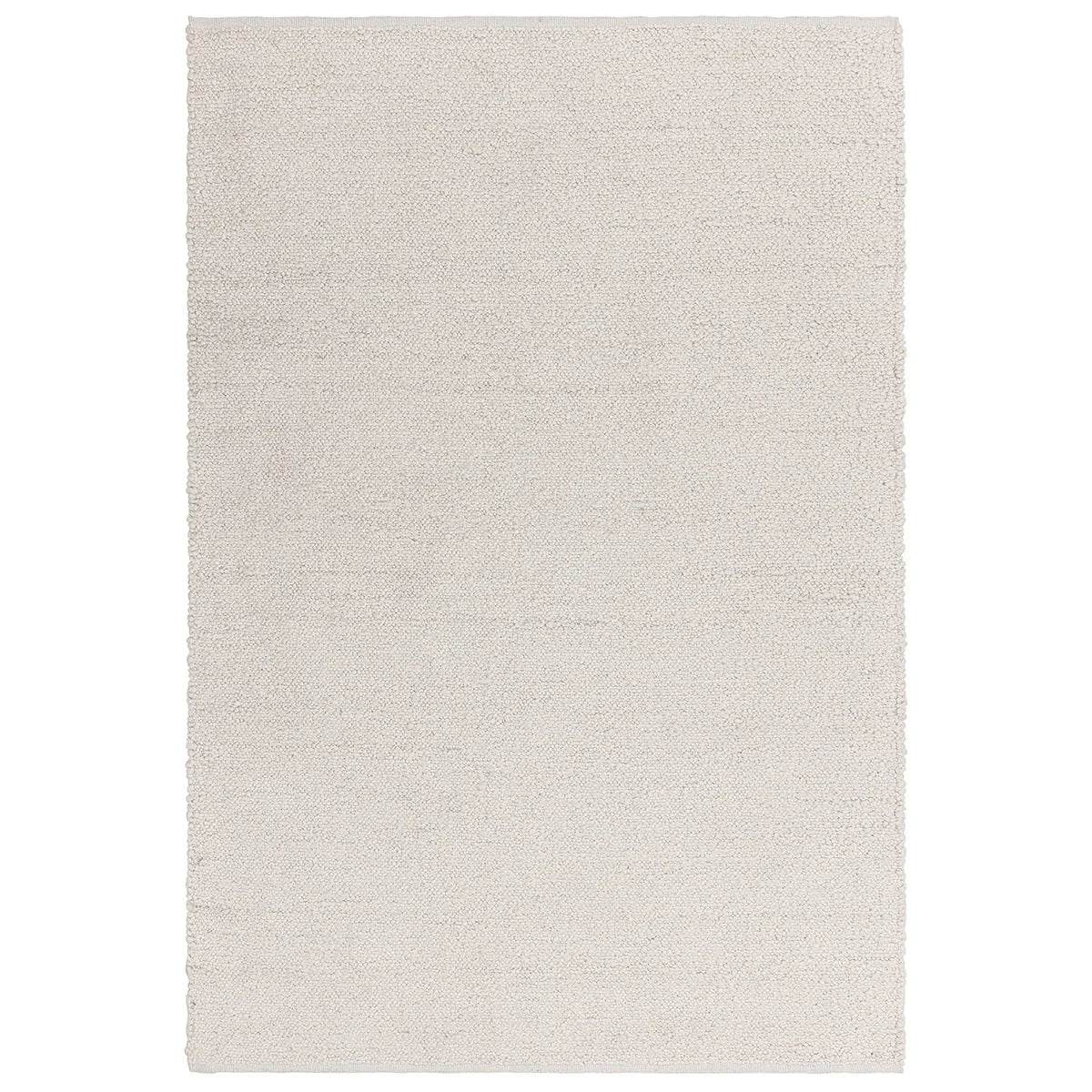 Asiatic Abbus Ivory rectangle rug styled in a living room