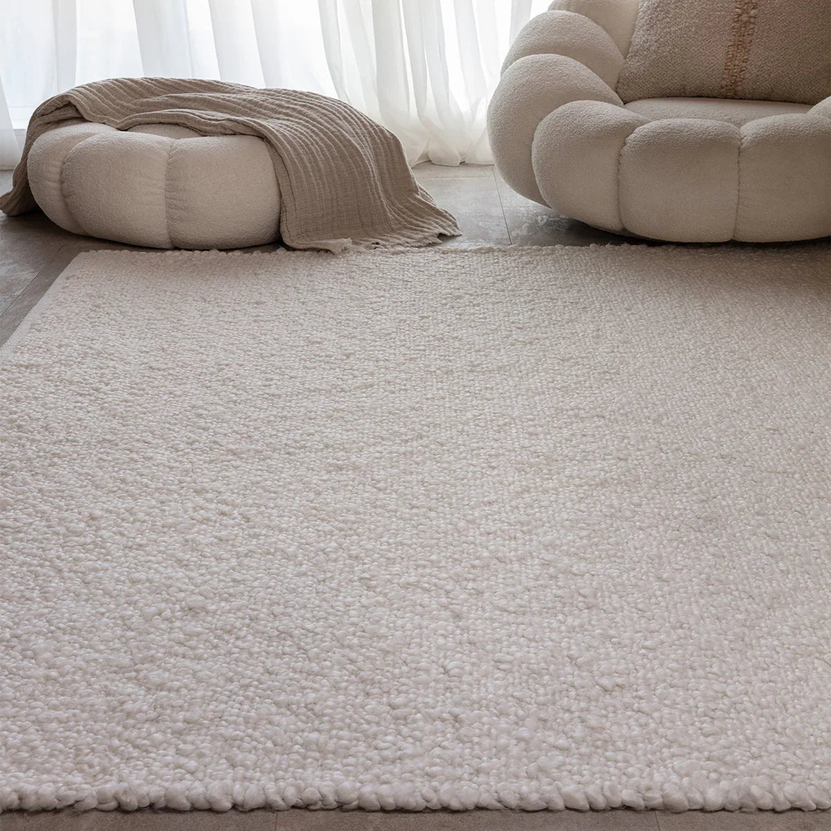 Asiatic Abbus Ivory Designer Rug featuring solid shag in ivory, cream and warm beige on light beige colour flooring, power-loomed wool-blend
