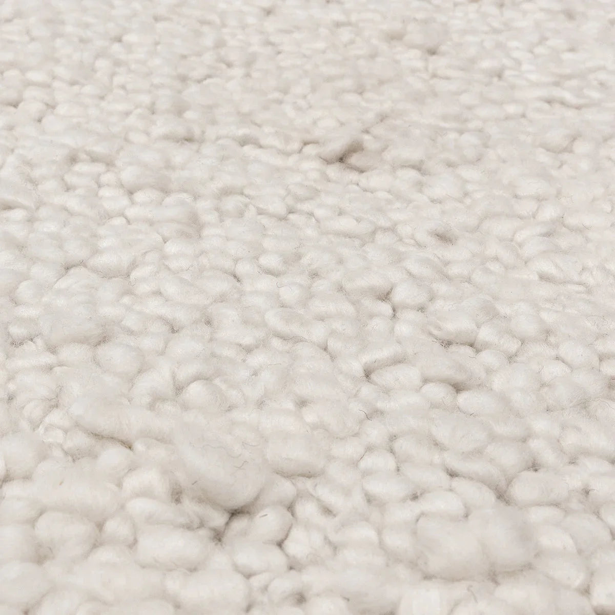 Asiatic Abbus Ivory Designer Rug featuring shag texture in ivory, cream on ivory background, hand-tufted wool