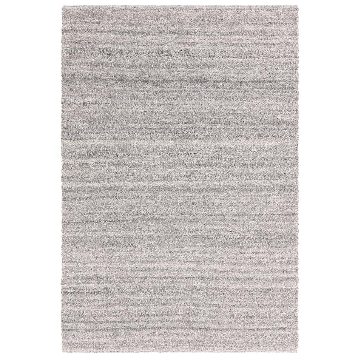 Asiatic Abbus Steel rectangle rug styled in a living room