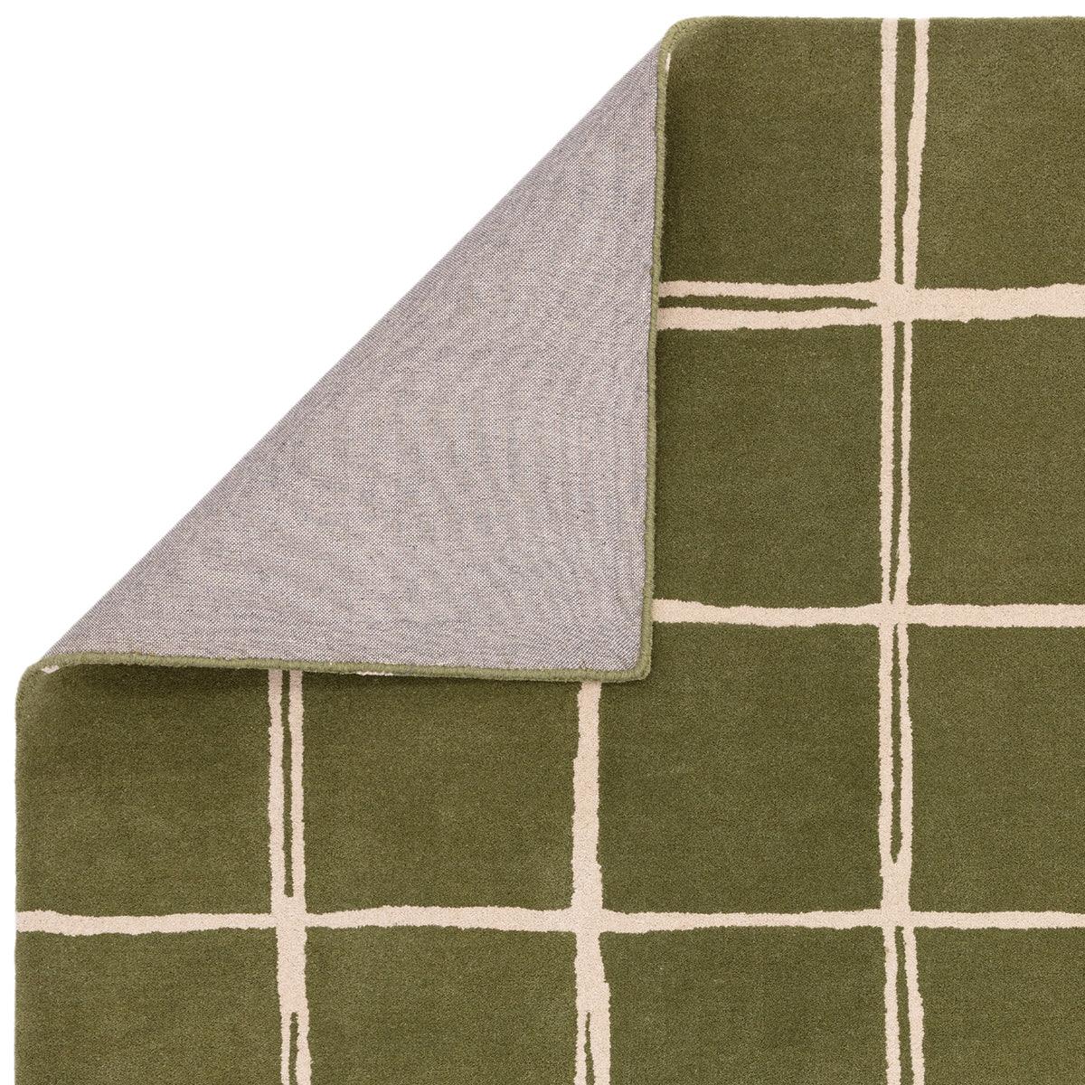 Asiatic Albany Grid Olive Designer Rug featuring olive-green grid with cream lines on olive background, grey underside