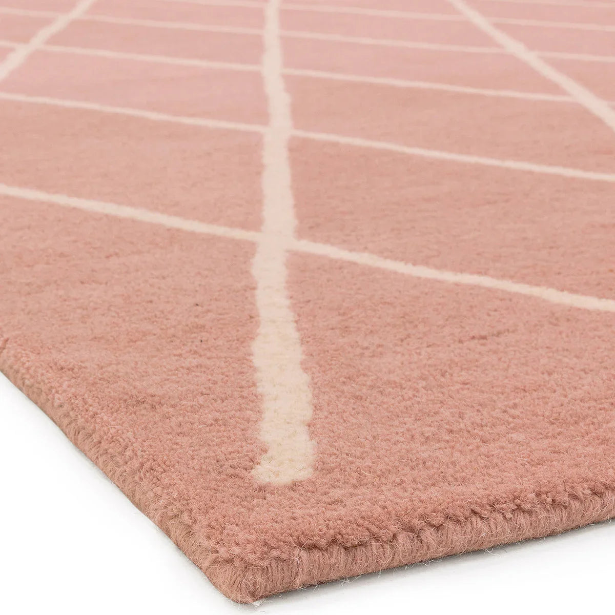 Asiatic Albany Diamond Pink Designer Rug featuring diamond grid in blush pink & ivory on pink background, tufted wool