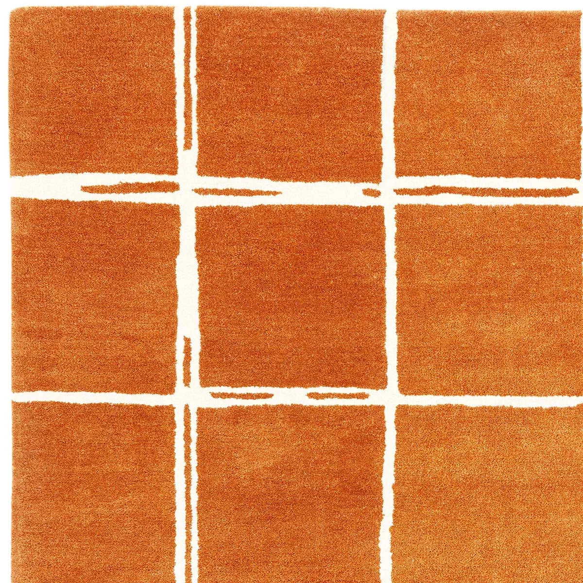 Asiatic Albany Grid Rust Designer Rug featuring grid pattern in rust-orange and white on white, unknown construction unknown material