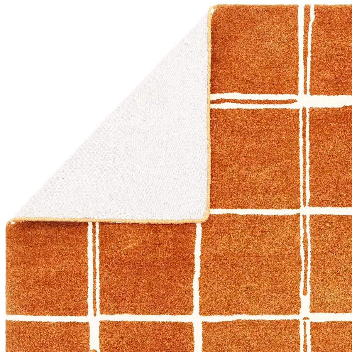 Asiatic Albany Grid Rust Designer Rug featuring grid pattern in rust orange and white on cream background, tufted wool