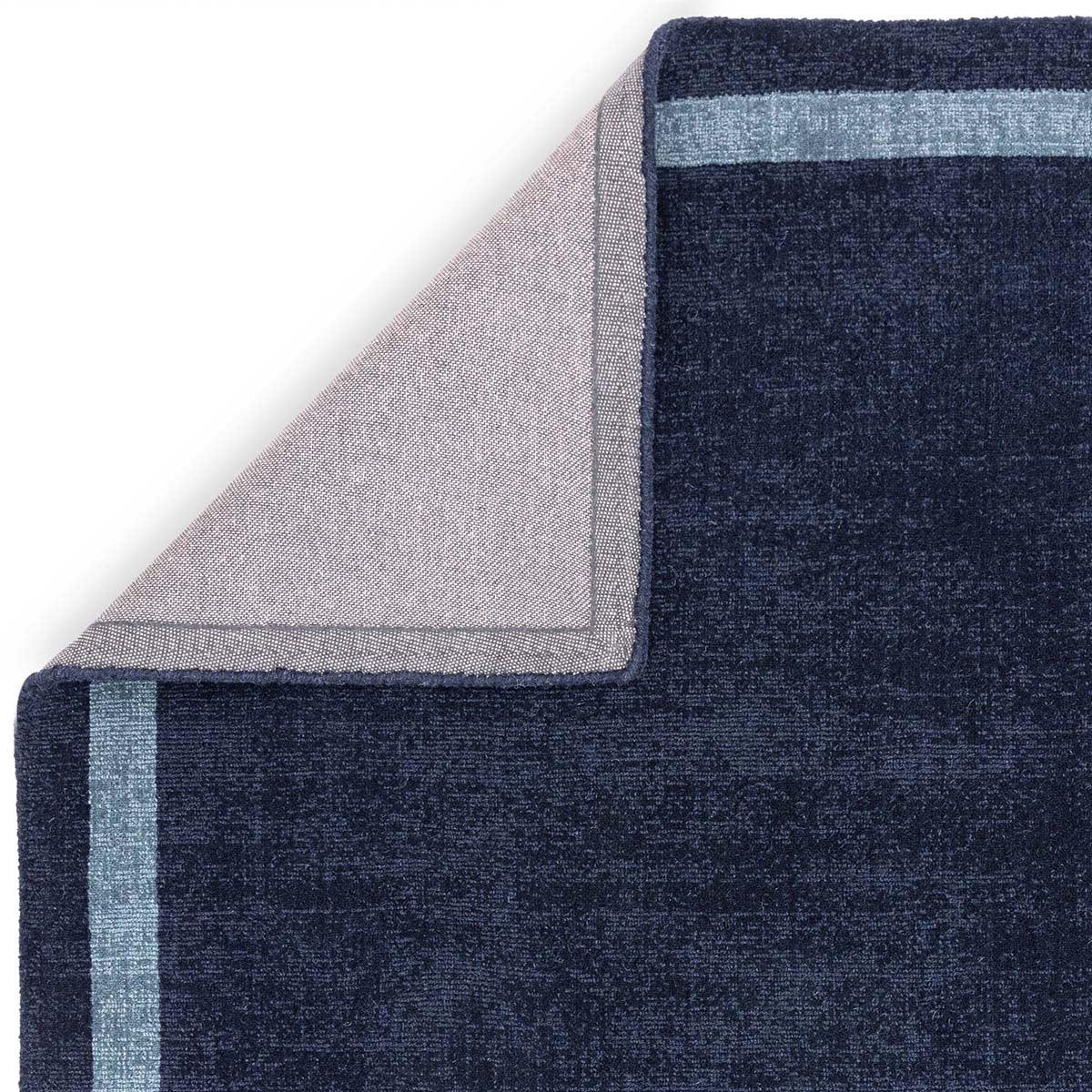 Asiatic Albi Navy Runner featuring striped border in navy, steel and powder blues on navy field, machine-made wool