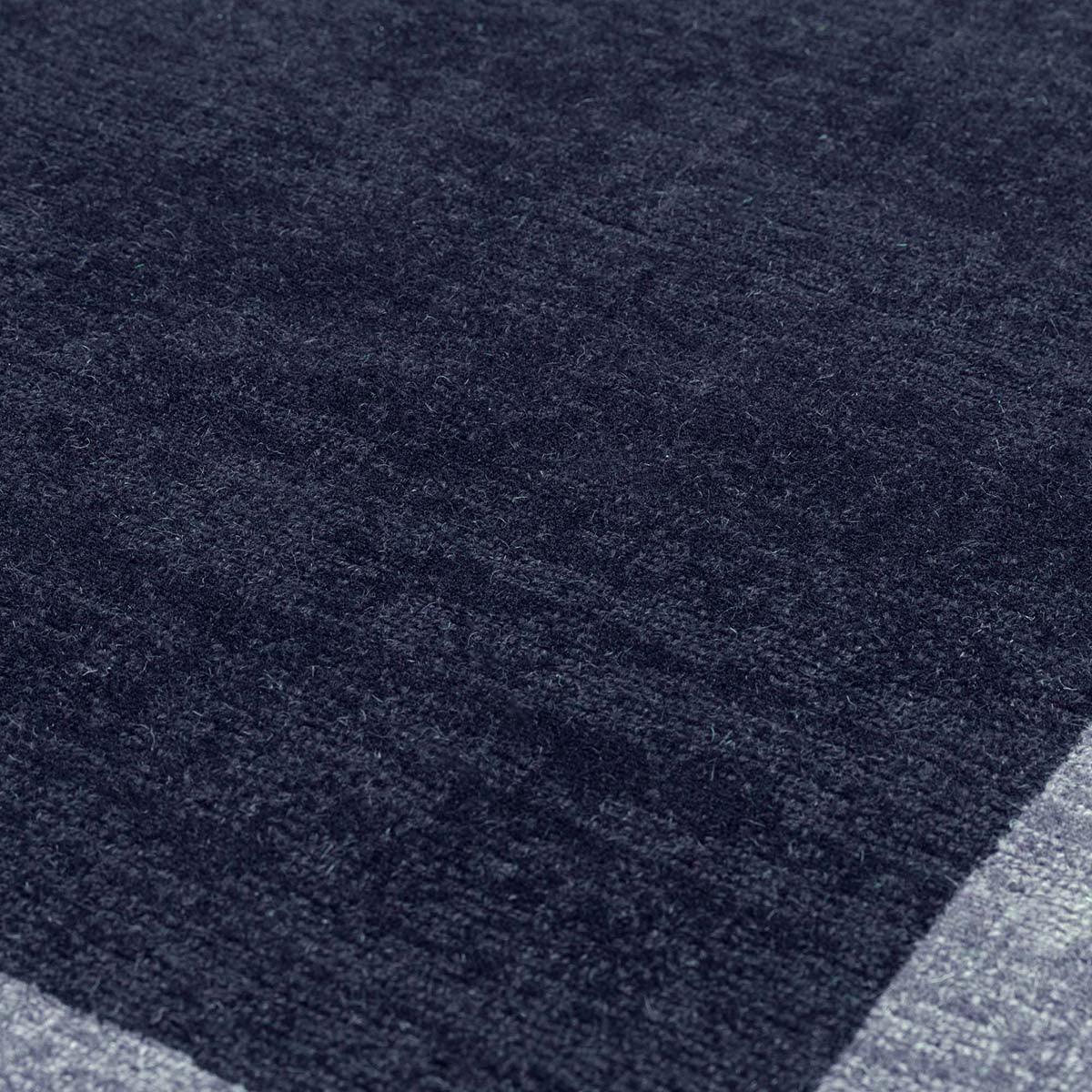 Asiatic Albi Navy Runner featuring navy pile with subtle texture and light grey border on navy, hand-tufted wool