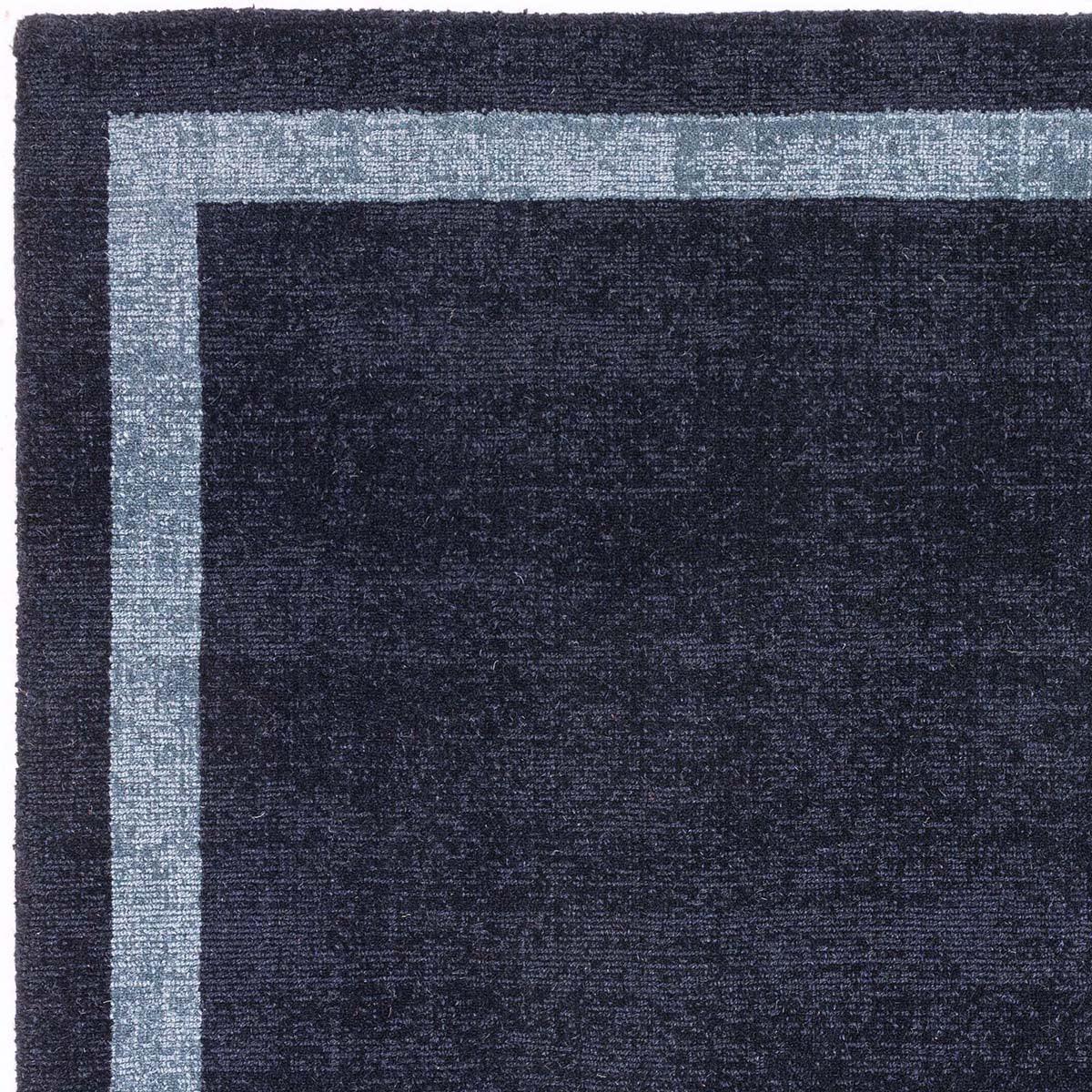 Asiatic Albi Navy Designer Rug featuring border in navy, steel blue and light blue on navy background, hand-tufted wool
