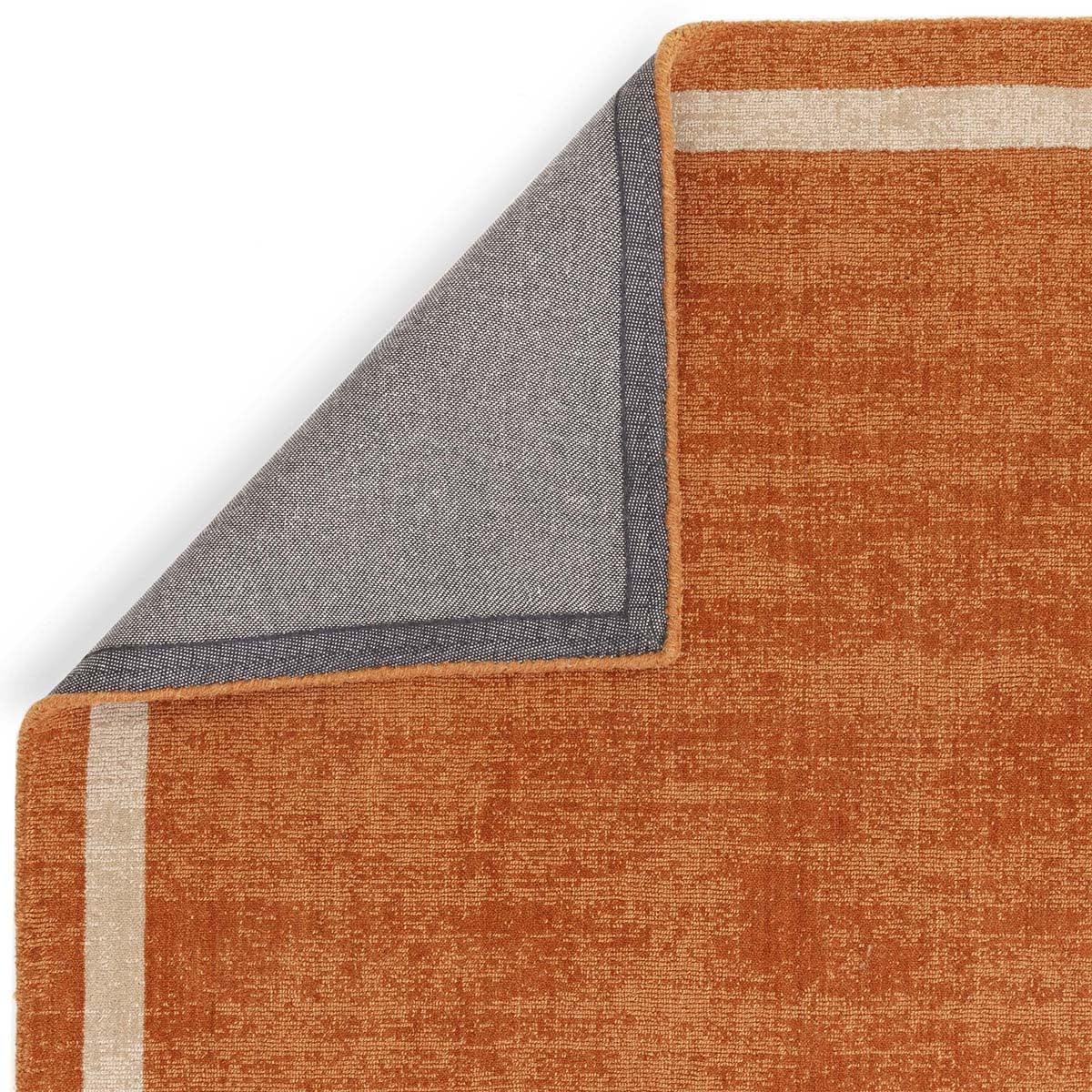 Asiatic Albi Orange Runner with orange field and cream border stripe on white background, machine-made synthetic fibers