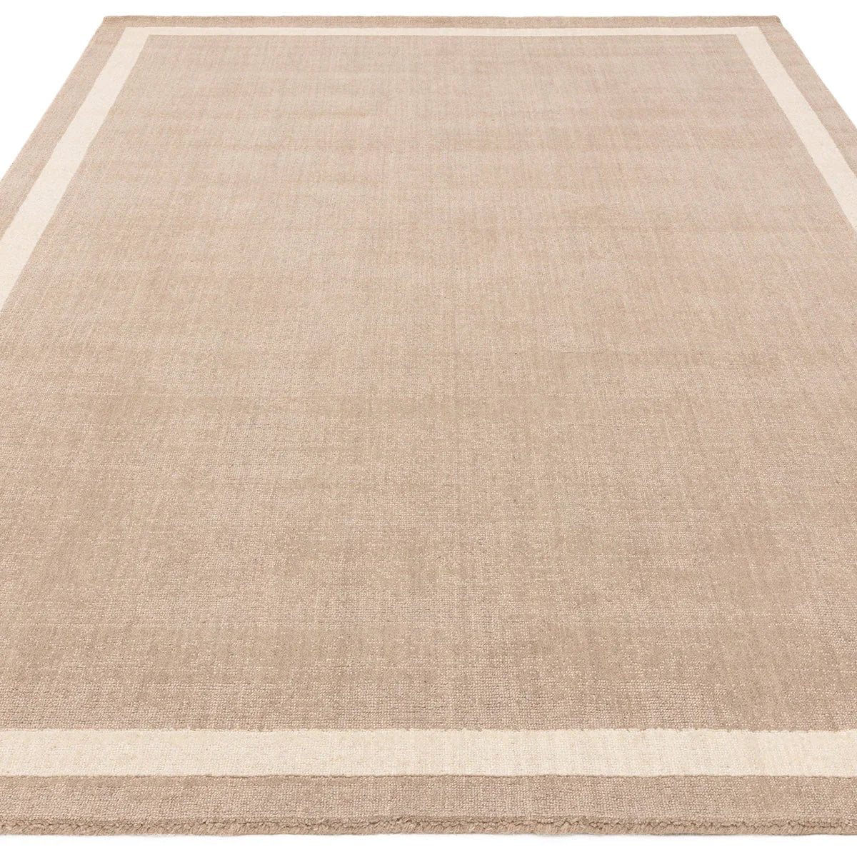 Asiatic Albi Sand Designer Rug featuring bordered field in sand and cream on white background, hand-tufted wool