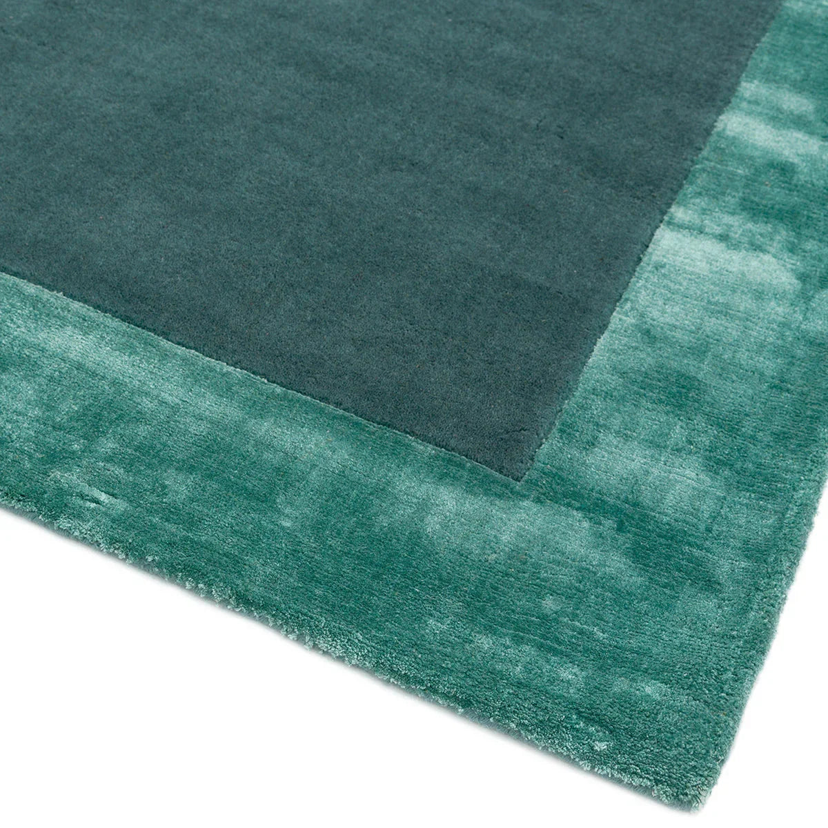 Asiatic Ascot Aqua Blue Rug featuring pattern in deep teal, teal and aqua on white background, machine-made wool