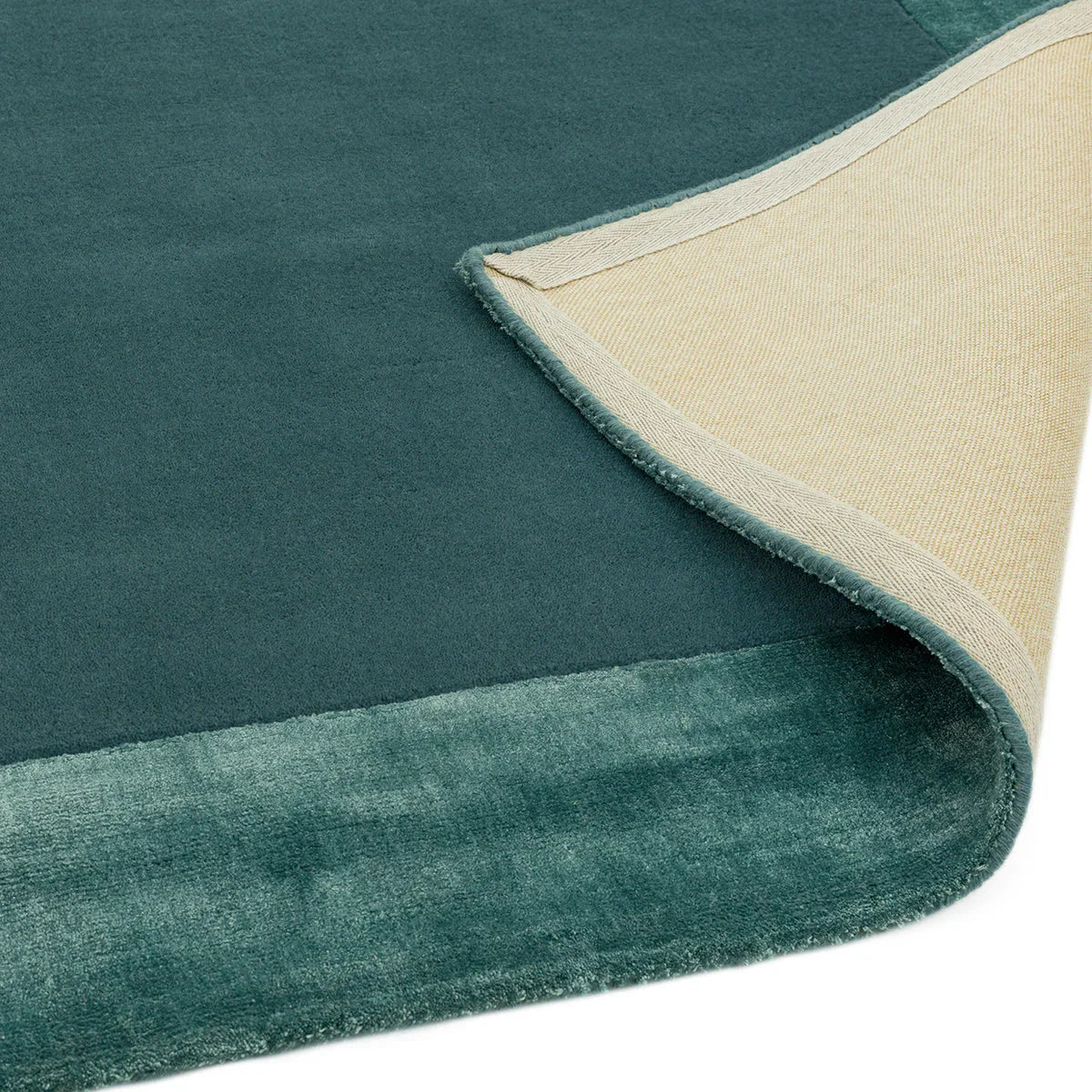 Asiatic Ascot Aqua Blue Designer Rug featuring colour field in aqua blue and teal on cream backing, hand-tufted wool