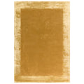 Asiatic Ascot Gold rectangle rug styled in a living room