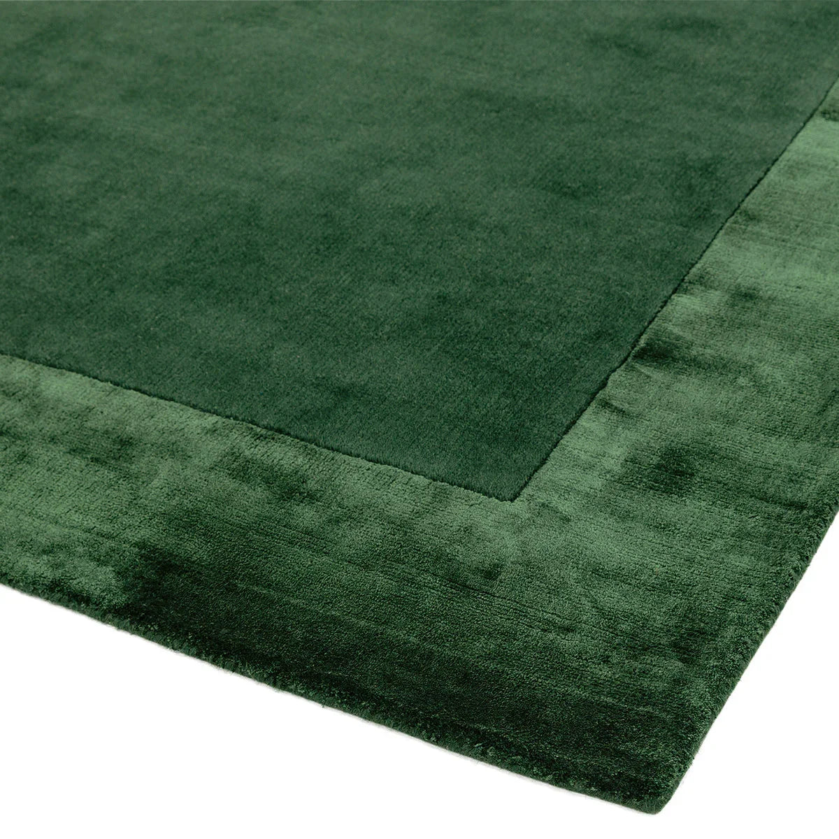 Asiatic Ascot Green Designer Rug featuring solid emerald green, forest green and olive on white, machine-made wool