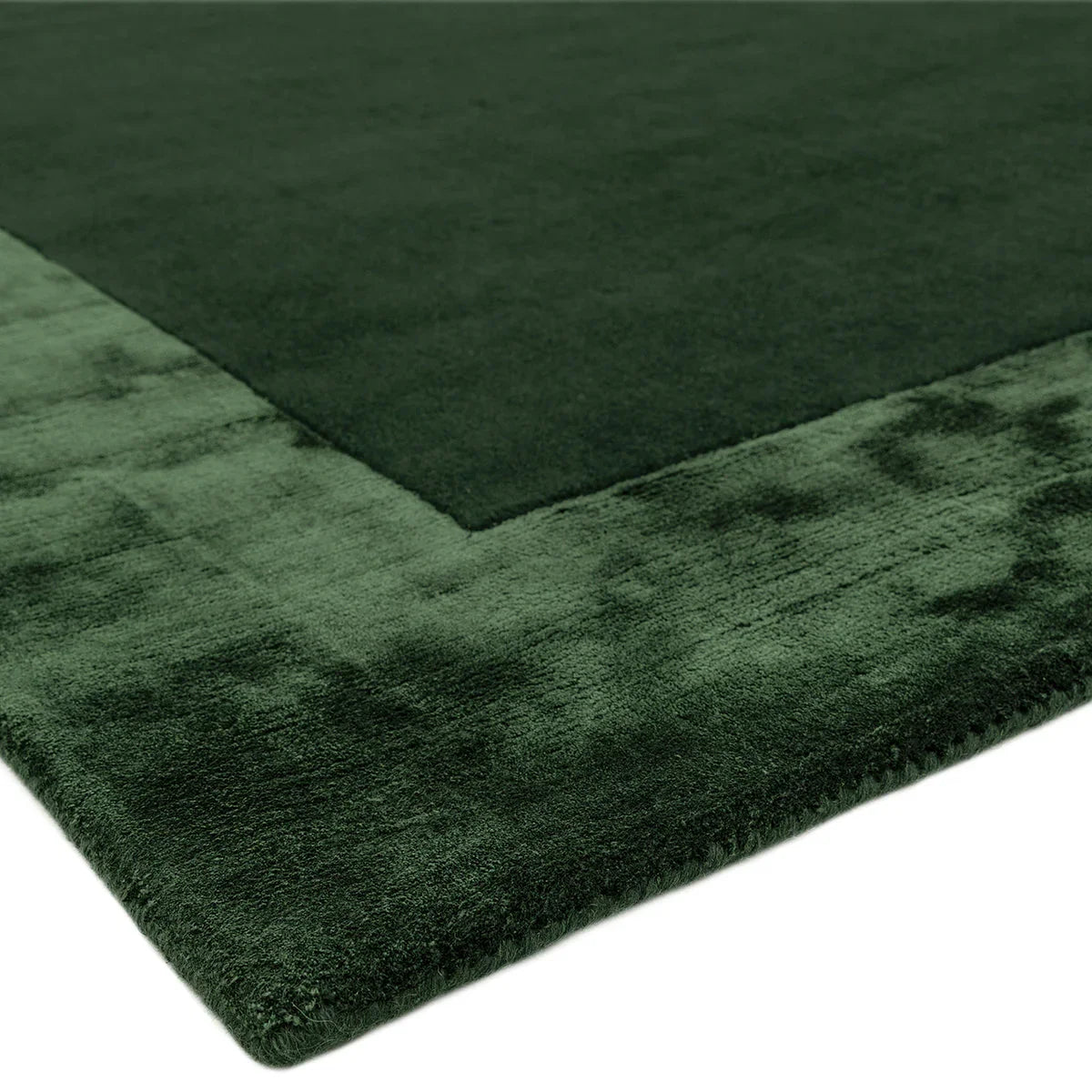 Asiatic Ascot Green Designer Rug featuring two-tone border in deep forest and emerald greens on white, hand-tufted wool
