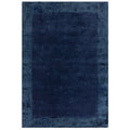 Asiatic Ascot Navy rectangle rug styled in a living room
