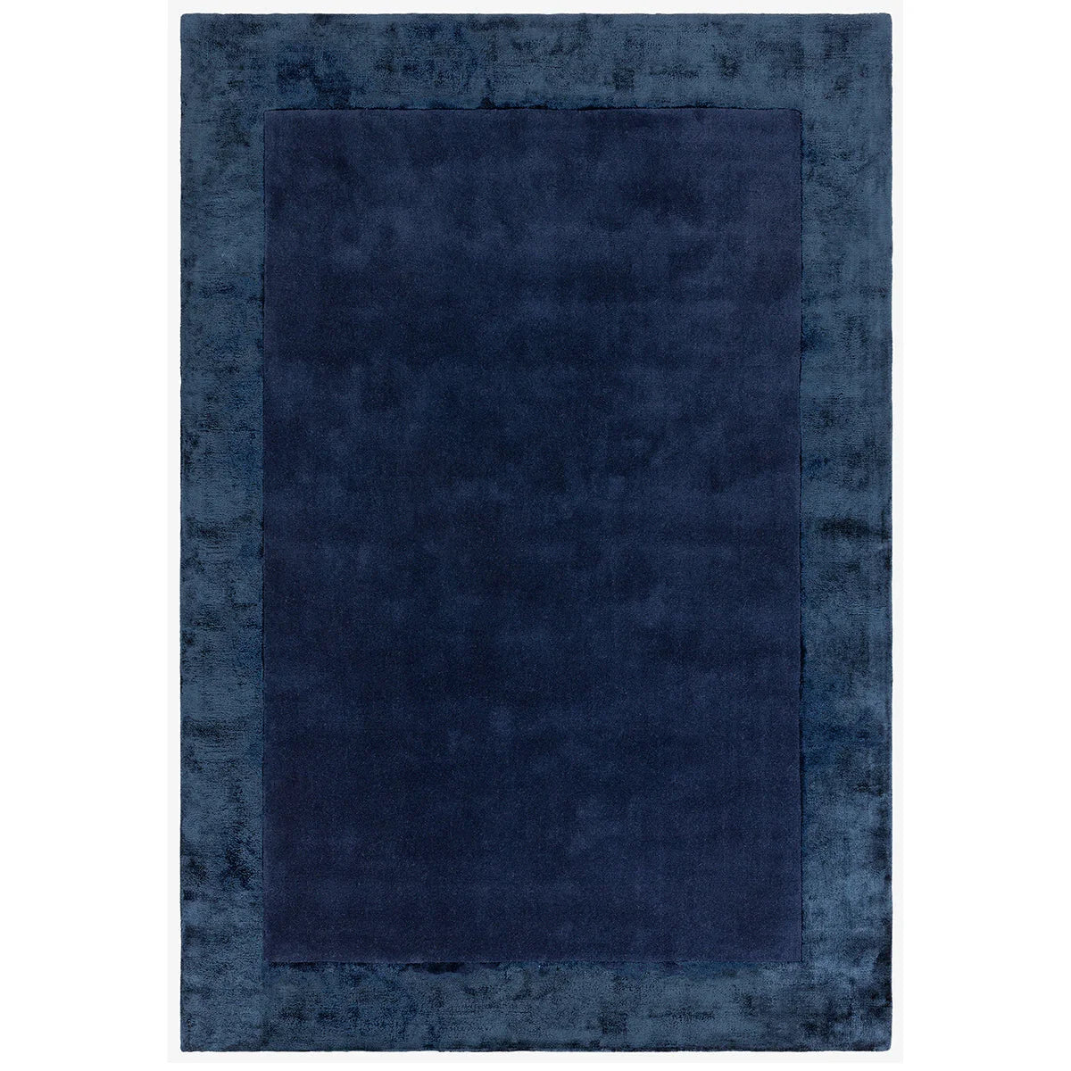 Asiatic Ascot Navy rectangle rug styled in a living room