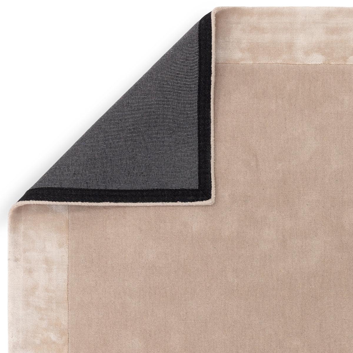 Asiatic Ascot Putty Designer Rug featuring solid colour field in putty beige, navy and black on white, hand-tufted wool