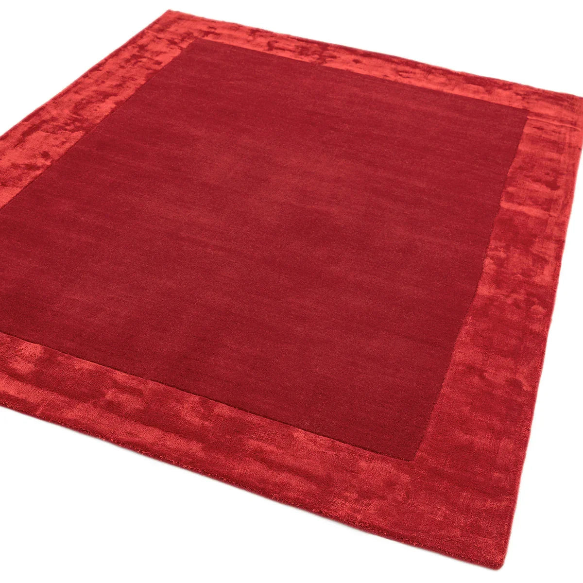 Asiatic Ascot Red Designer Rug featuring solid crimson centre with burgundy border on a red field, Asiatic Carpets London