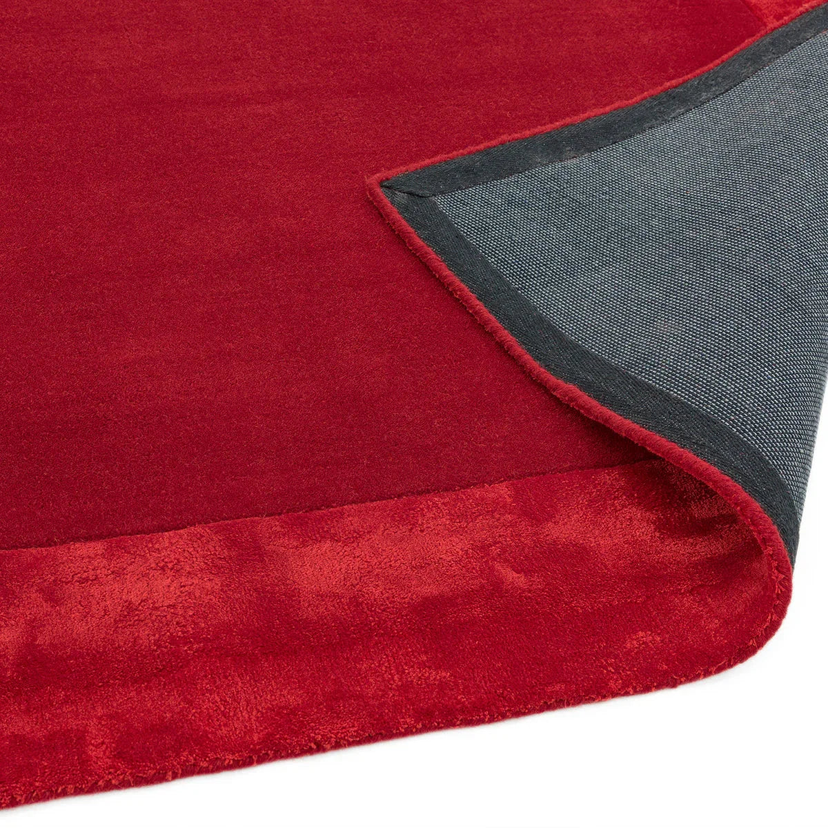 Asiatic Ascot Red Designer Rug featuring solid crimson red, charcoal and blue-grey on white background, hand-tufted wool