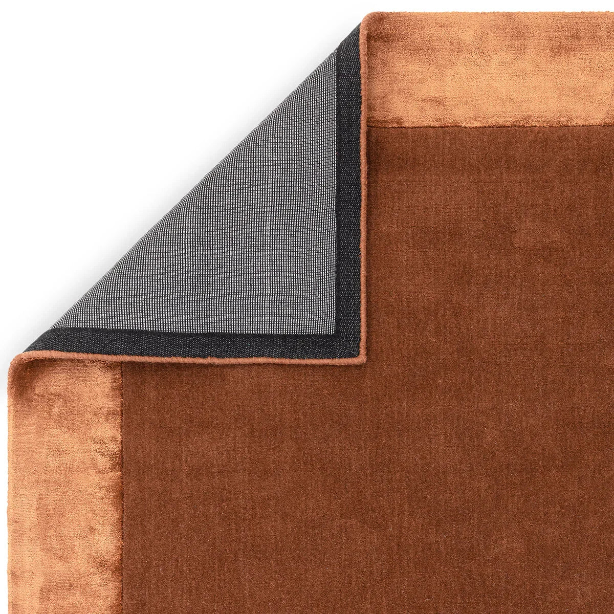 Asiatic Ascot Rust Designer Rug featuring rust tones in copper and bronze on white background, machine-made velvet