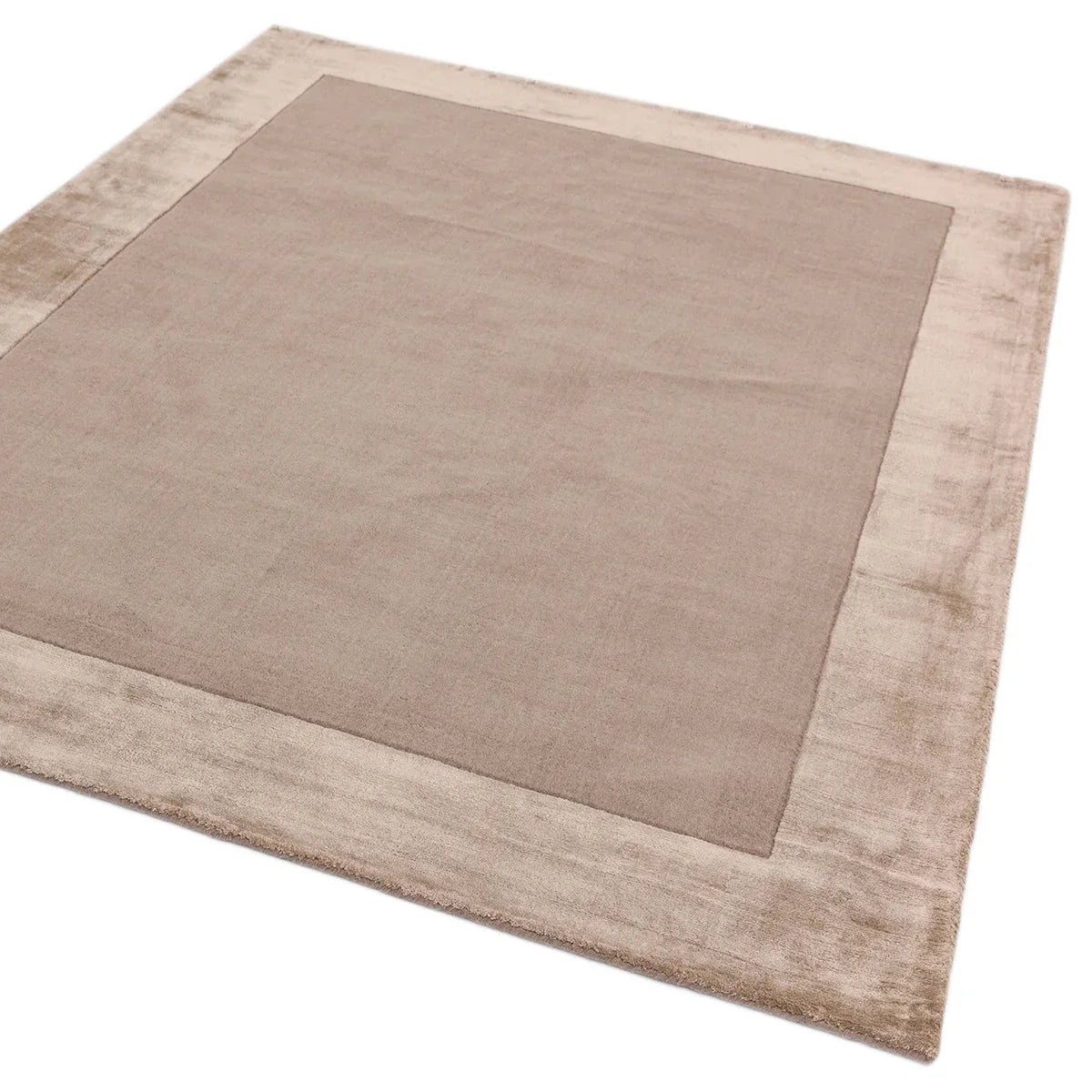 Asiatic Ascot Sand Designer Rug featuring minimalist solid-field design in taupe with beige border on sand, tufted wool