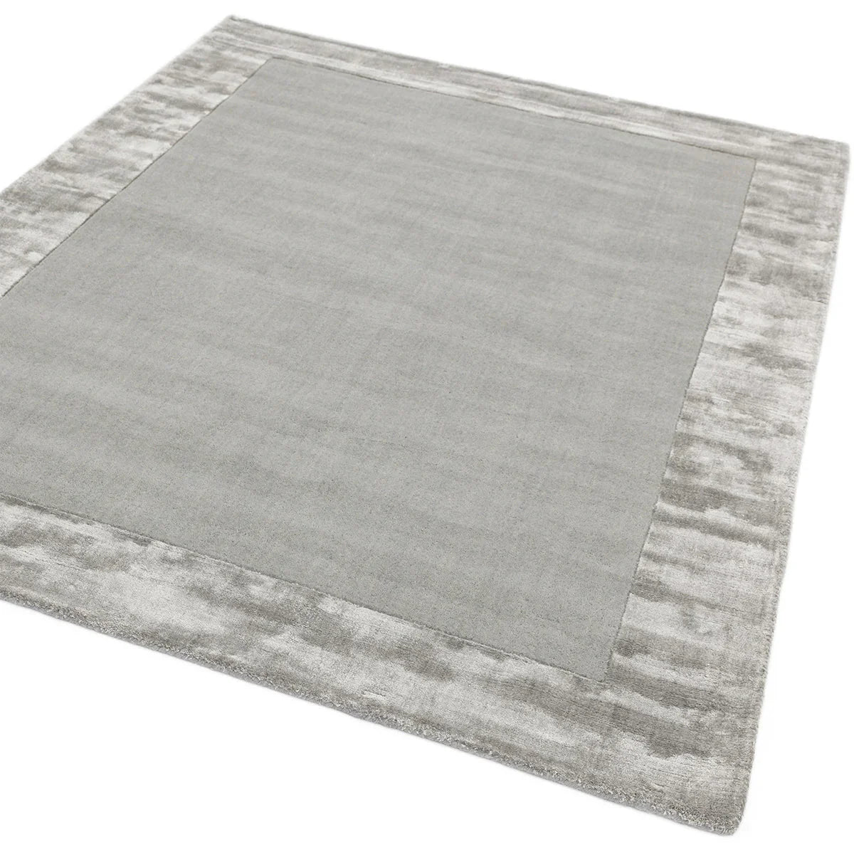 Asiatic Ascot Silver Designer Rug featuring field in light grey with a silver-grey edge on white, power-loomed viscose