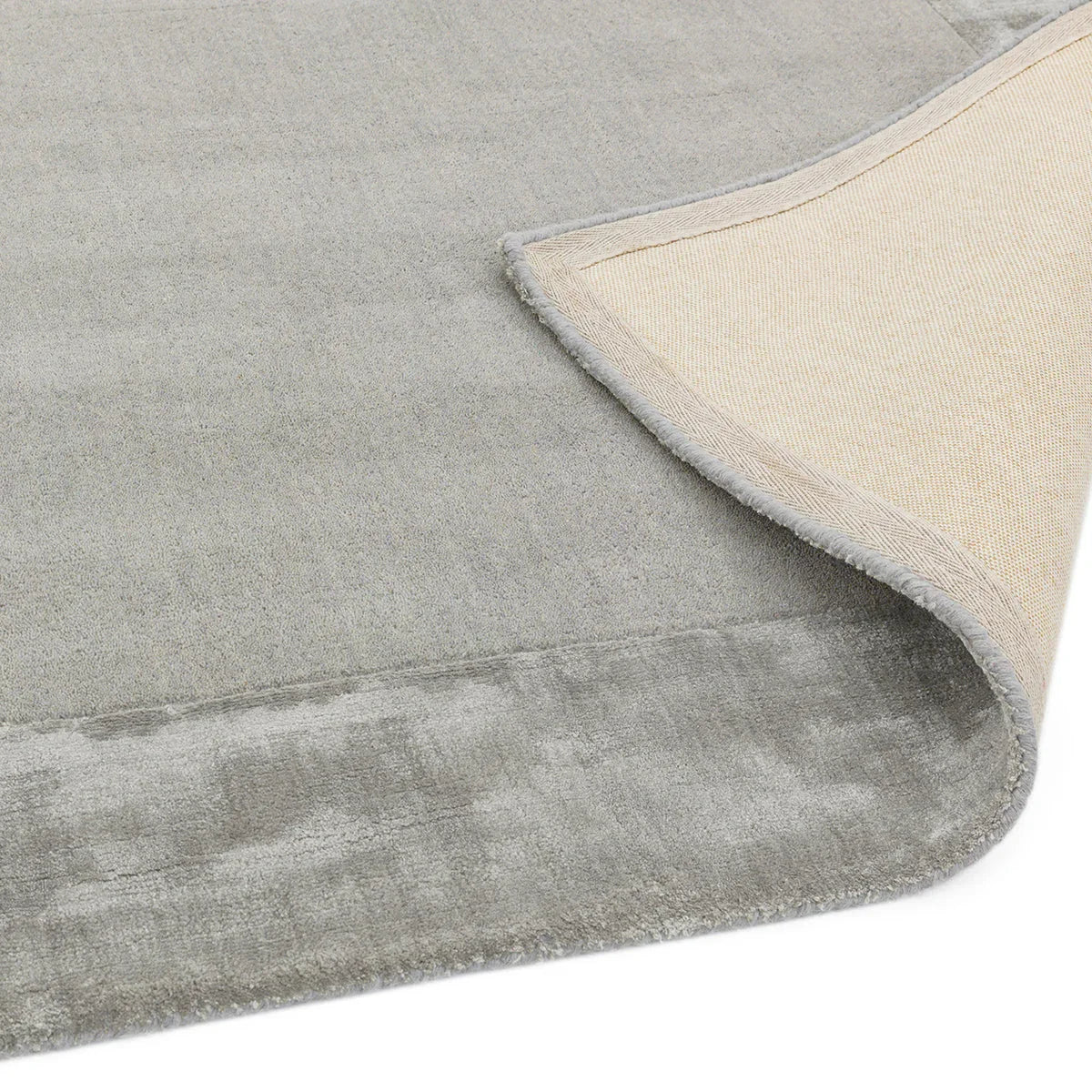Asiatic Ascot Silver Designer Rug featuring grey field in silver-grey and light grey on white backdrop machine-made wool