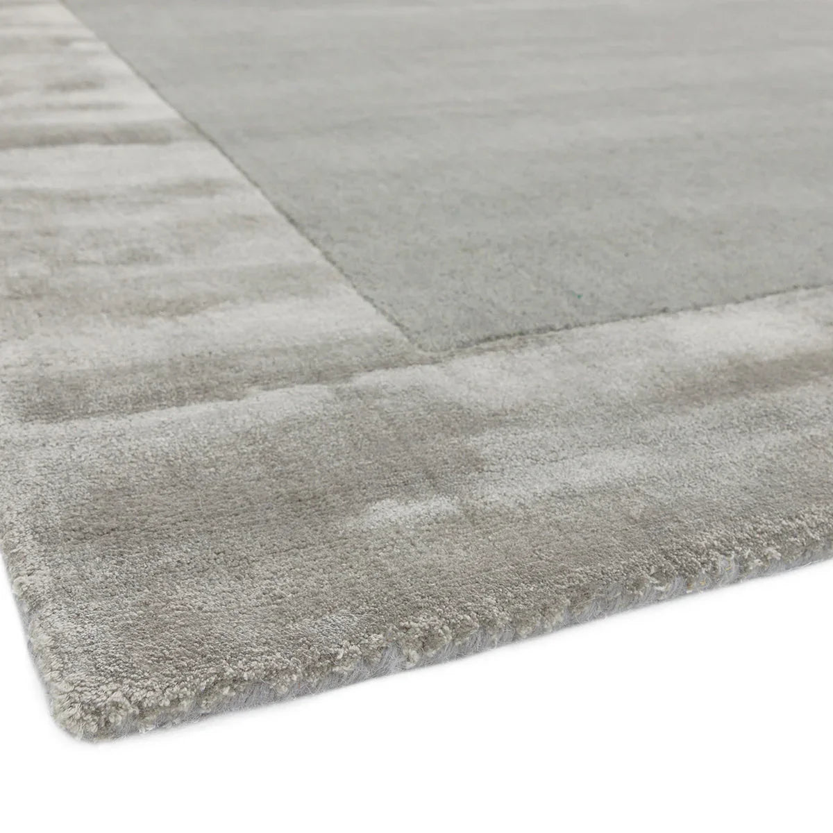 Asiatic Ascot Silver Designer Rug with tonal panel design in silver, grey and ivory on grey backdrop, hand-tufted wool