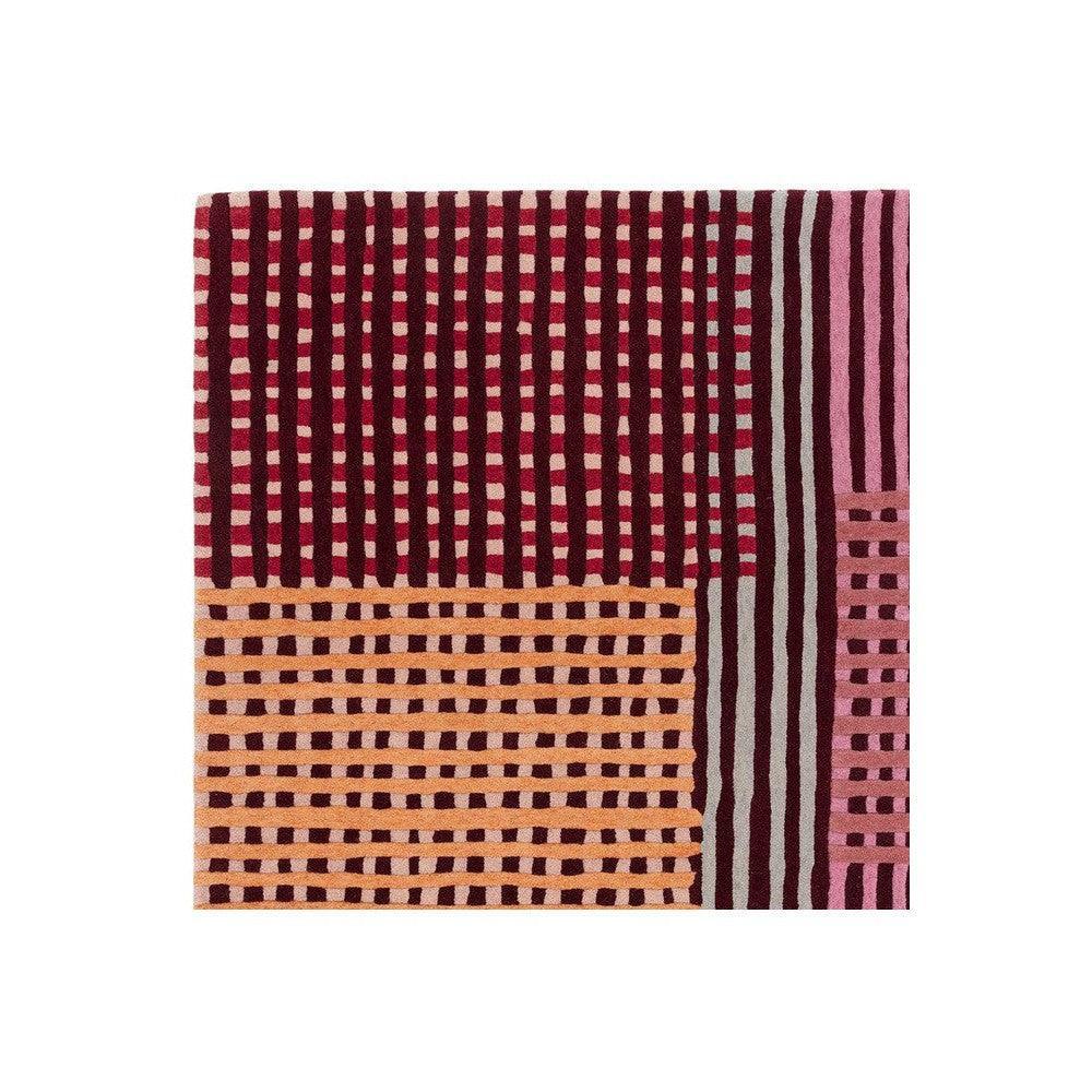 Asiatic Aspect Red Designer Rug featuring geometric striped blocks in burgundy, pink, orange and peach on charcoal grey background, hand-tufted wool