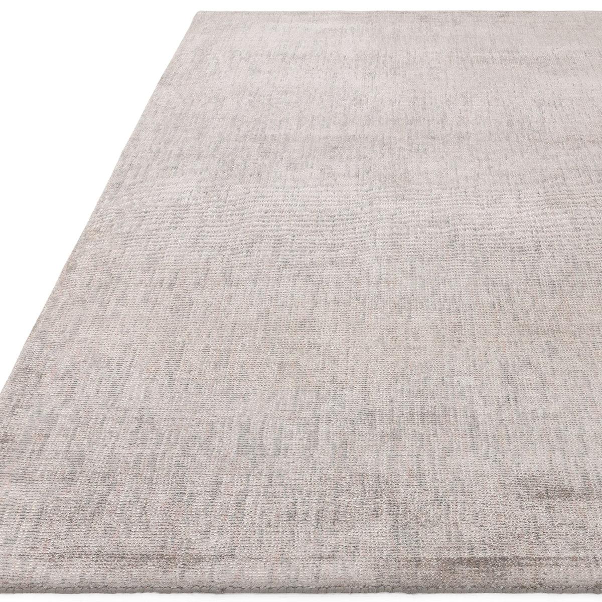 Asiatic Aston Silver Designer Rug featuring subtle textured pattern in silver grey and beige on white background, machine-made textile