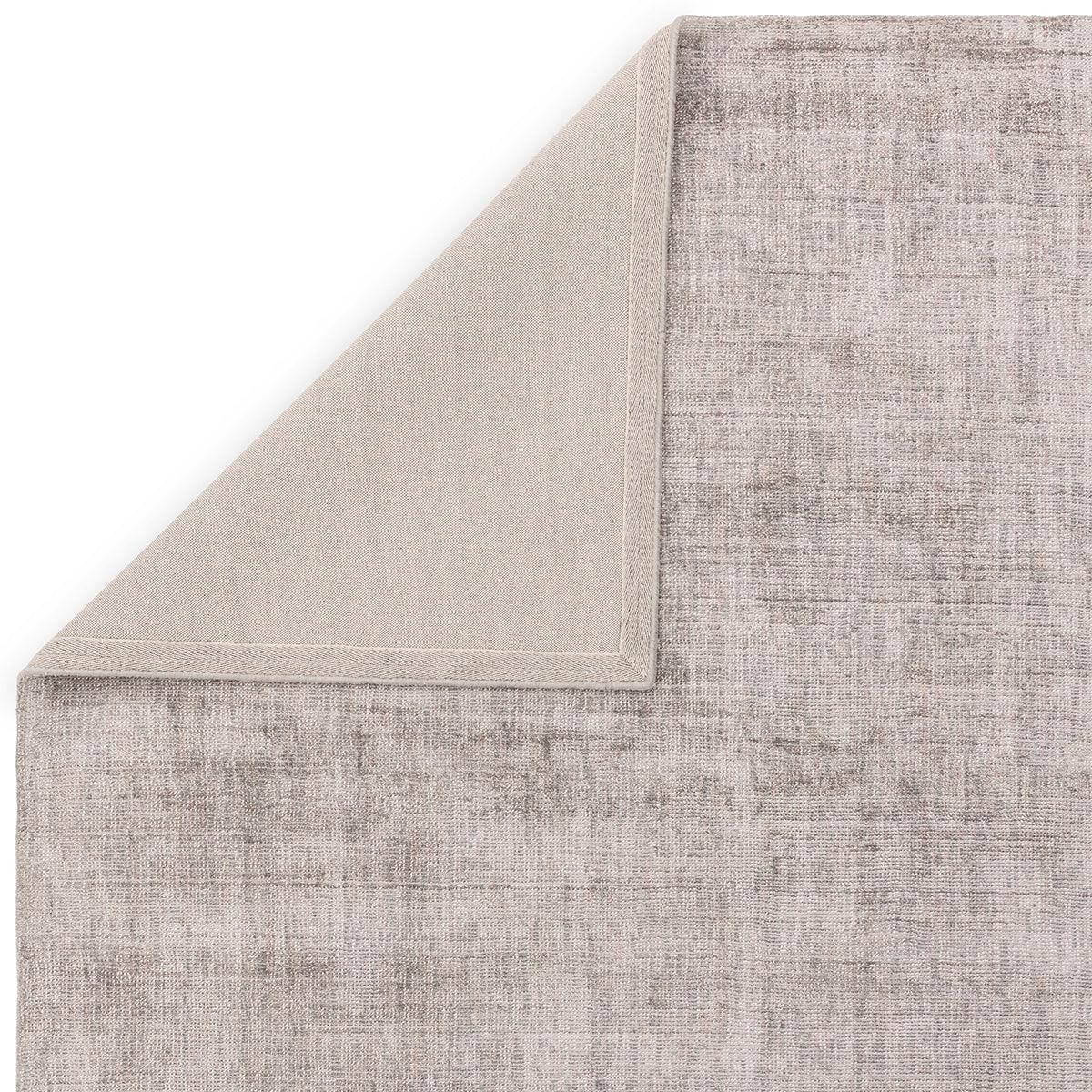Asiatic Aston Silver Designer Rug featuring distressed abstract pattern in beige, taupe, grey on white background, machine-woven wool