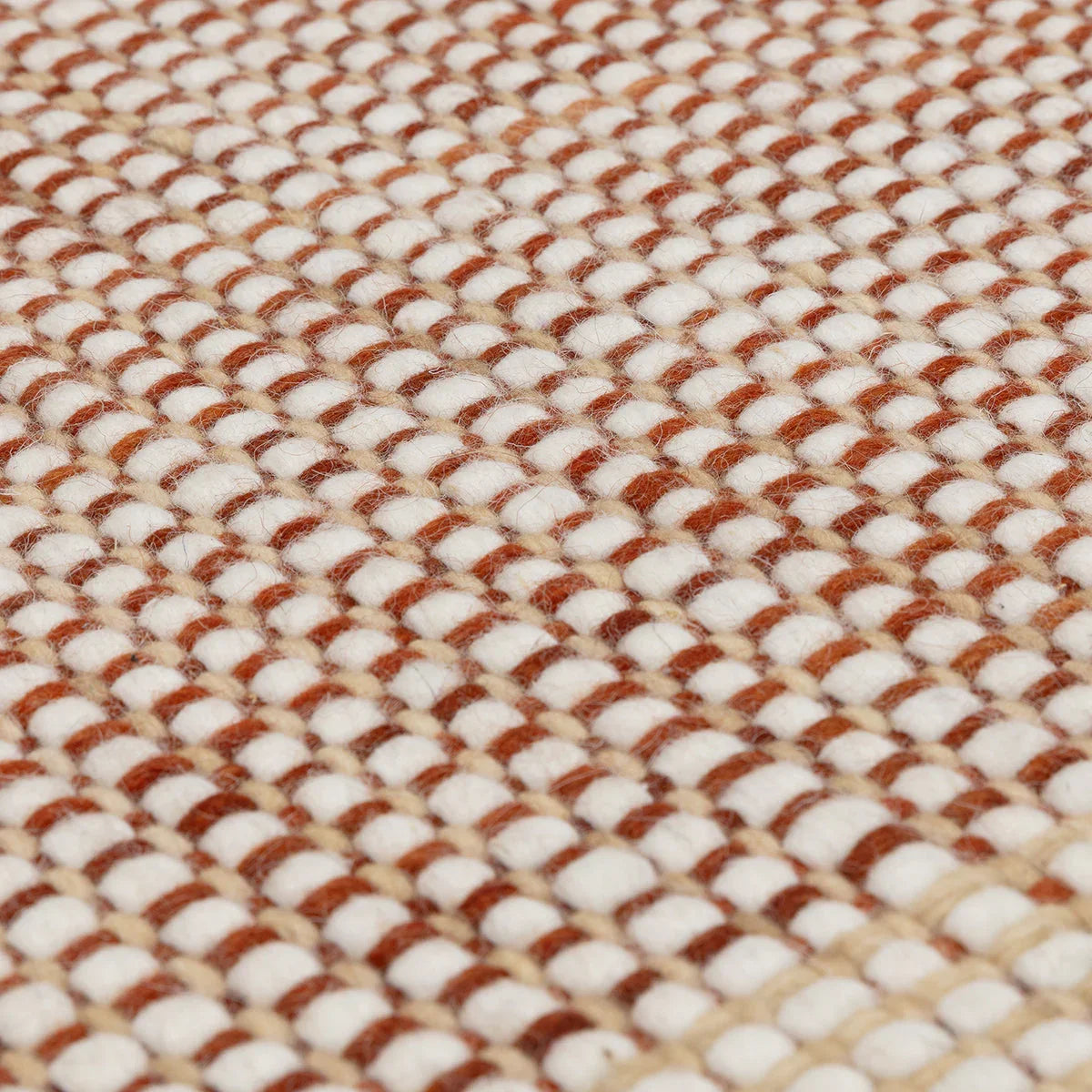 Asiatic Avalon Rust Designer Rug featuring textured boucle weave in rust, cream and beige on beige, hand-tufted wool
