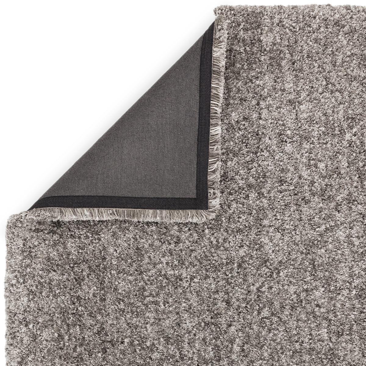 Asiatic Barnaby Grey Designer Rug featuring textured shag in grey tones on white background, machine-made wool