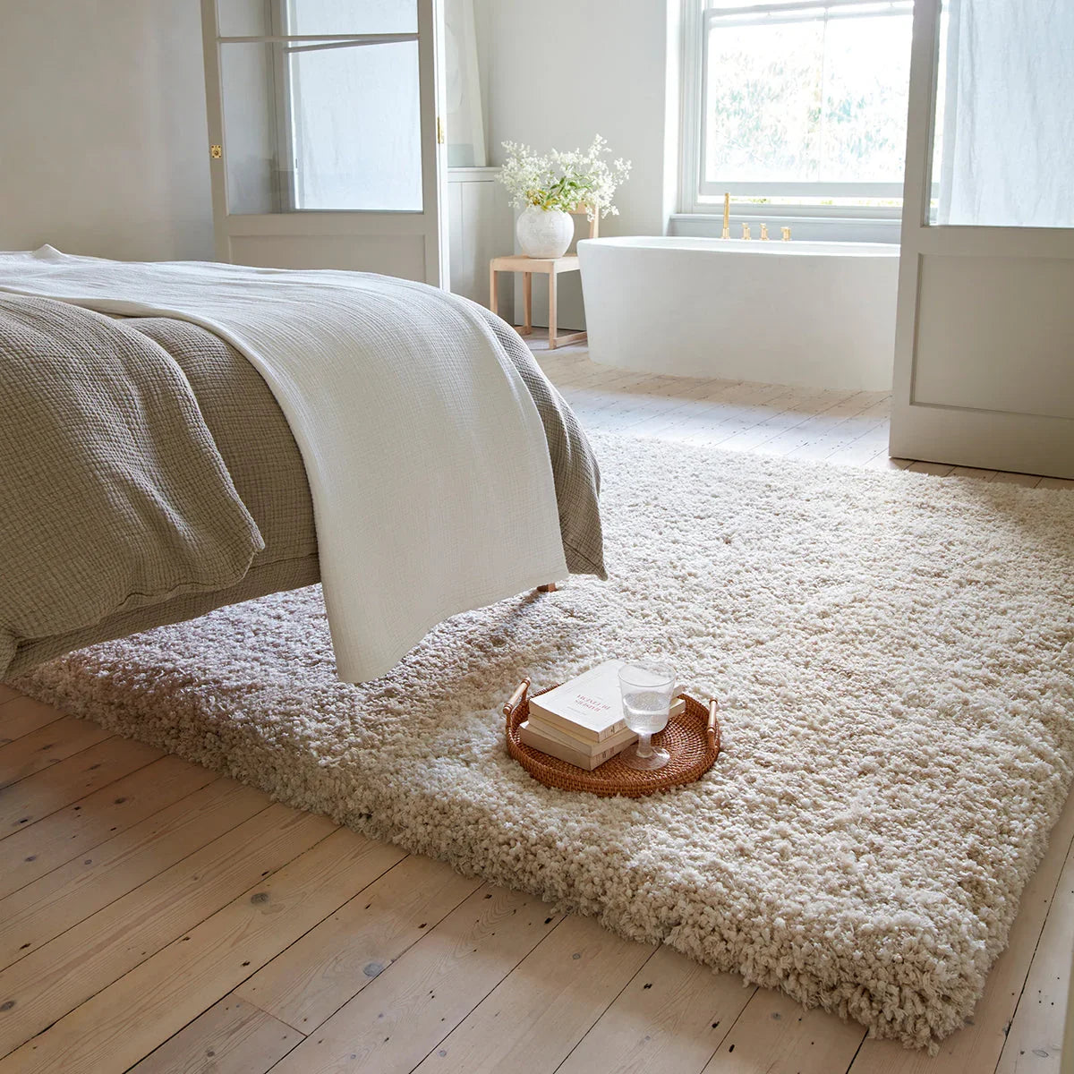 Asiatic Barnaby Sand Designer Rug featuring solid shag texture in sand, cream and beige on beige floor hand-tufted wool