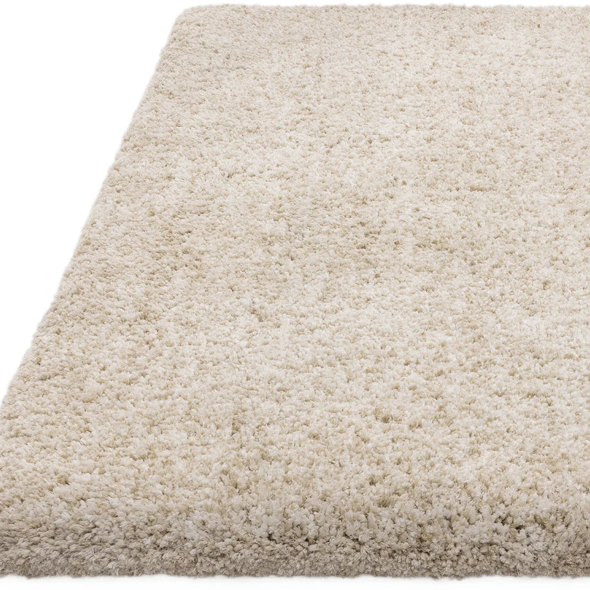 Asiatic Barnaby Sand Designer Rug featuring solid shag pile in sand, cream and ivory on white background, hand-tufted wool