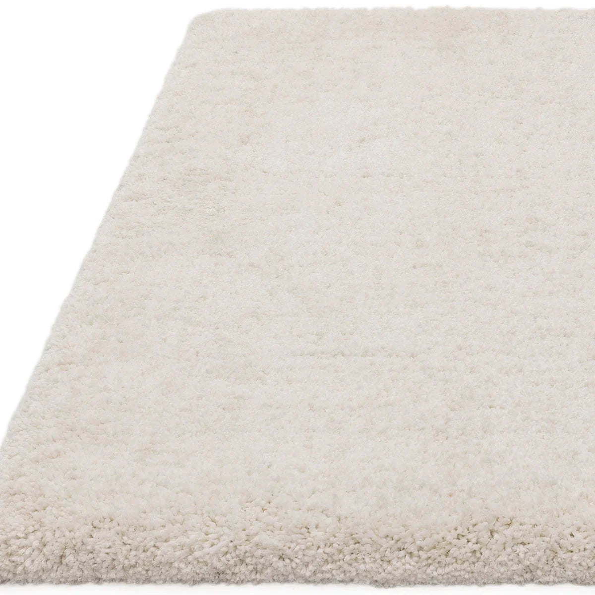 Asiatic Barnaby Off White Designer Rug featuring solid shag pattern in off-white/cream/ivory on white background, machine-made wool