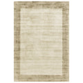 Asiatic Blade Border Smoke Putty rectangle rug styled in a living room