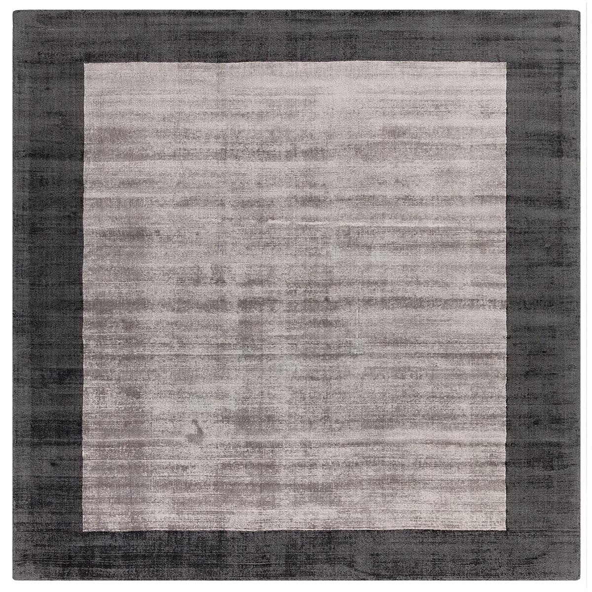 Asiatic Blade Border Charcoal Silver Square square rug styled in a living room