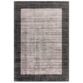 Asiatic Blade Border Charcoal Silver rectangle rug styled in a living room