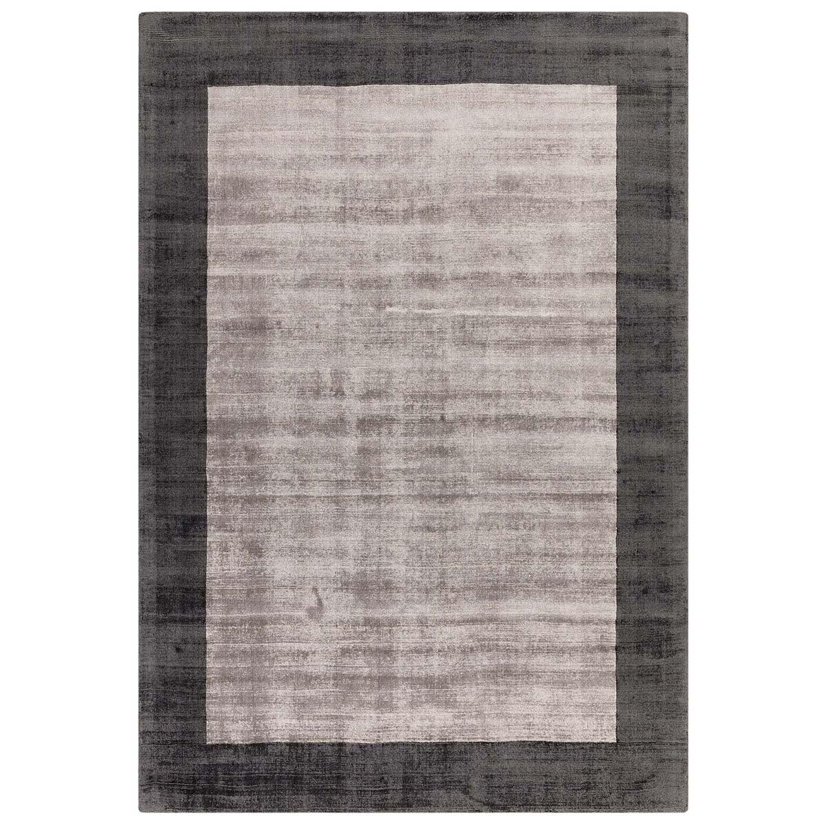 Asiatic Blade Border Charcoal Silver rectangle rug styled in a living room