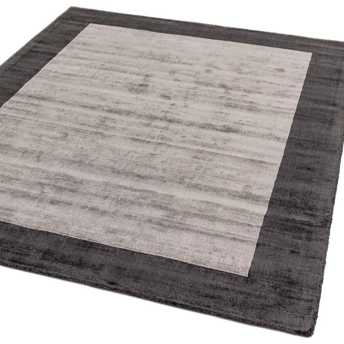 Asiatic Blade Border Charcoal Silver Rug featuring blade-border in charcoal, silver and ivory on cream background