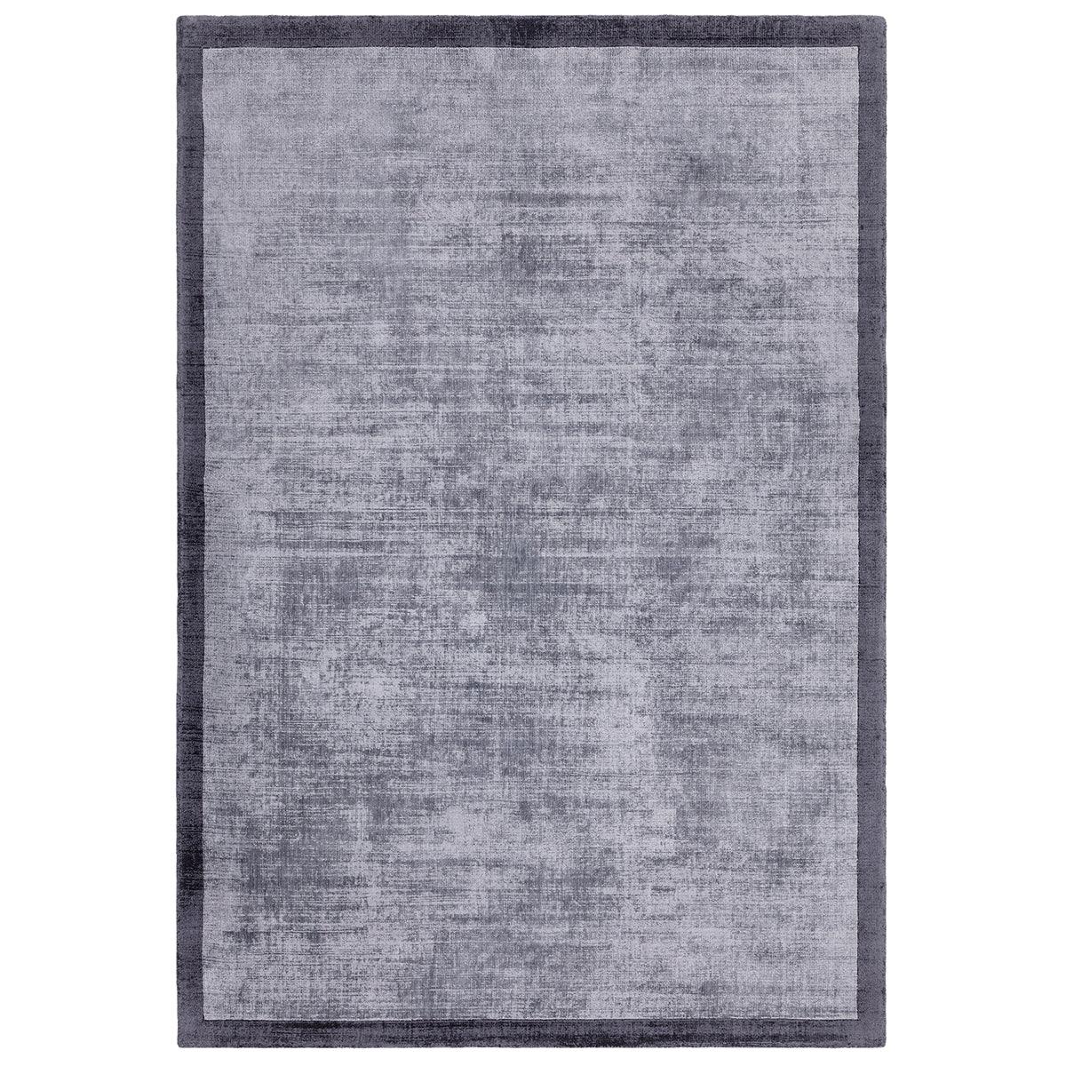Asiatic Blade Border Airforce Navy 06 rectangle rug styled in a living room