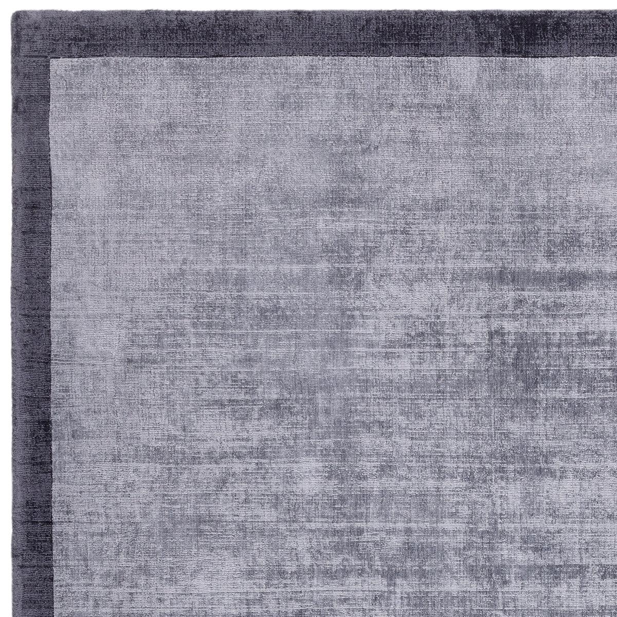 Asiatic Blade Border Airforce Navy 06 Rug blade-border in navy and grey on grey field, machine-made fabric