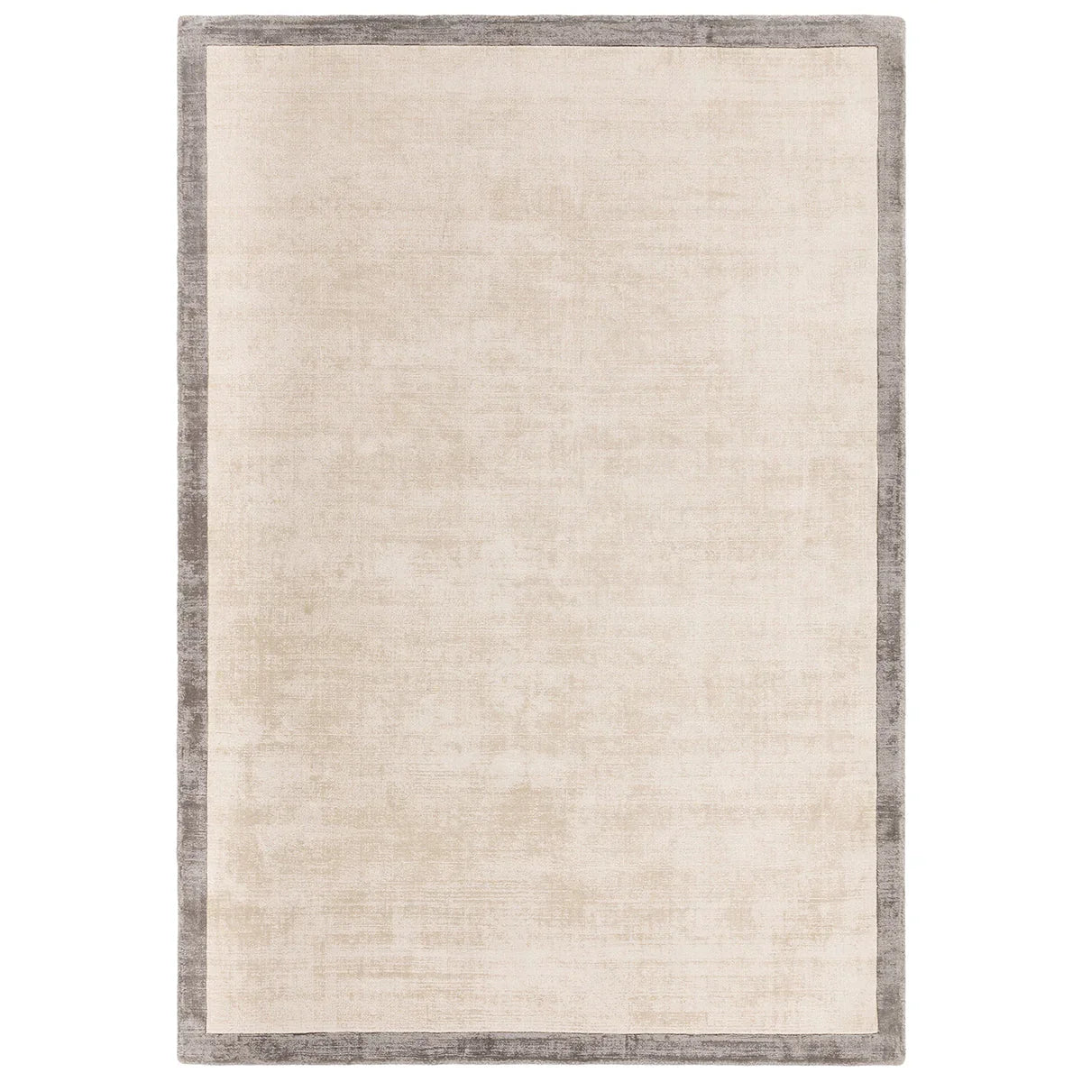 Asiatic Blade Border Putty Silver 07 rectangle rug styled in a living room